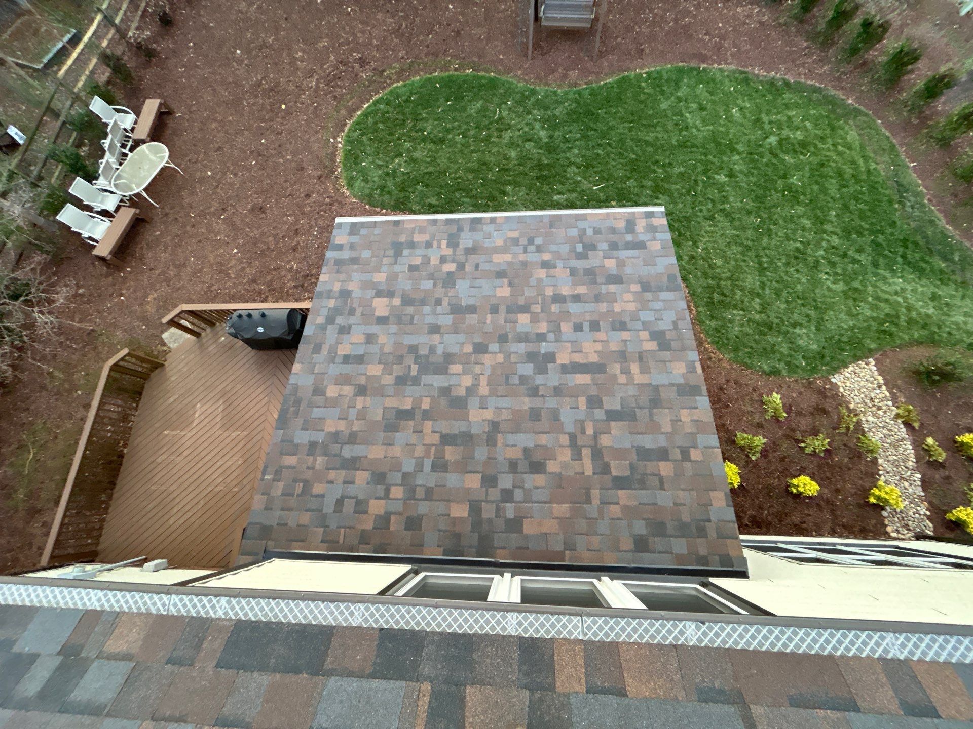 Owens Corning Duration Shingle Roof Replacement and Velux Skylight Installation in Charlotte by Merritt Roofing LLC