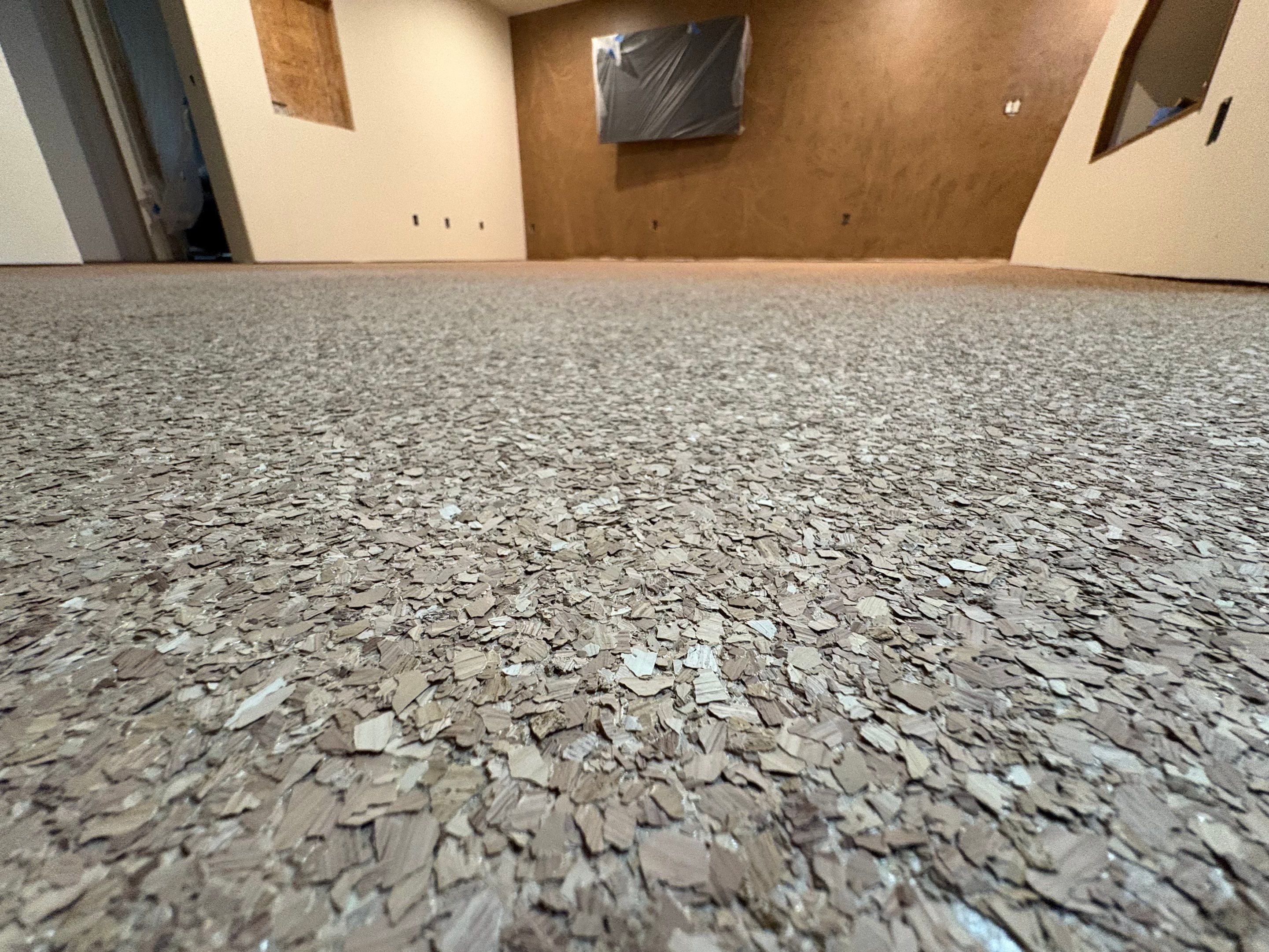 Custom Chip Concrete Coating for Colman Basement and Garage by Select Painting, Coatings & Garage Cabinets