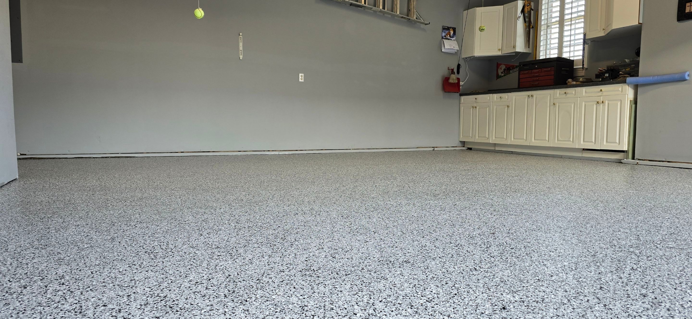 Garage using Houndstooth by Elite Floor Solutions