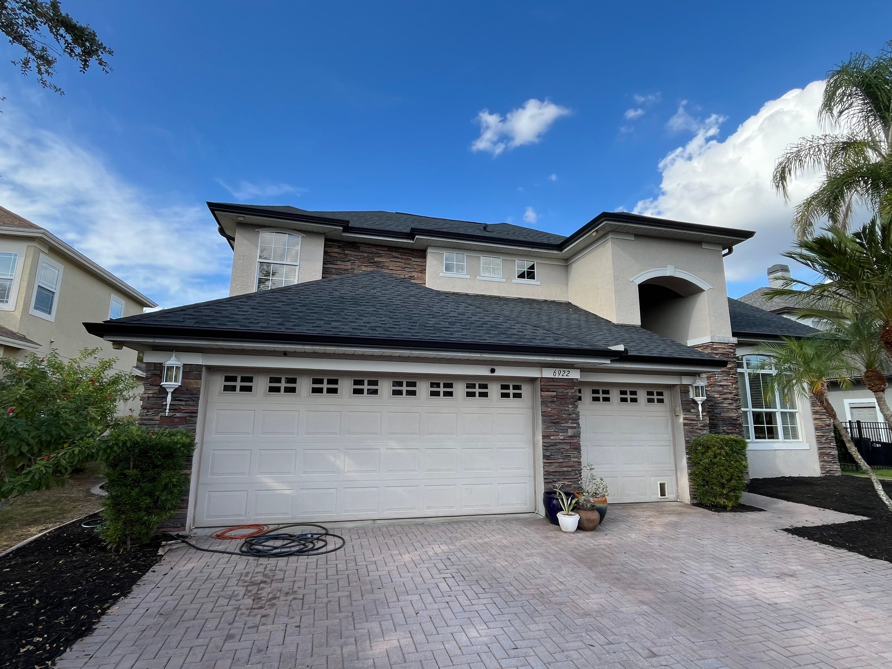 Black 6-inch Seamless Gutters for Modern Ellenton Homes FL by Gutter Professors