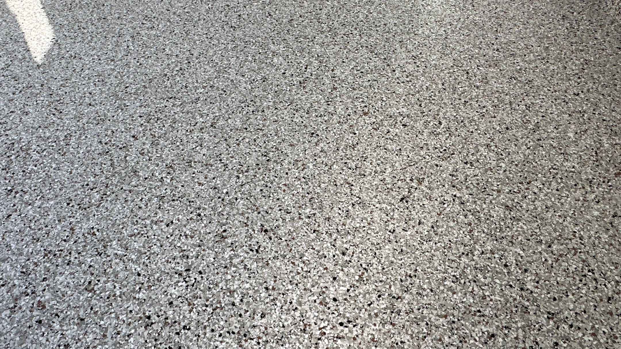 Mike M. got him self a beautiful Coyote flake floor by Banner Garage