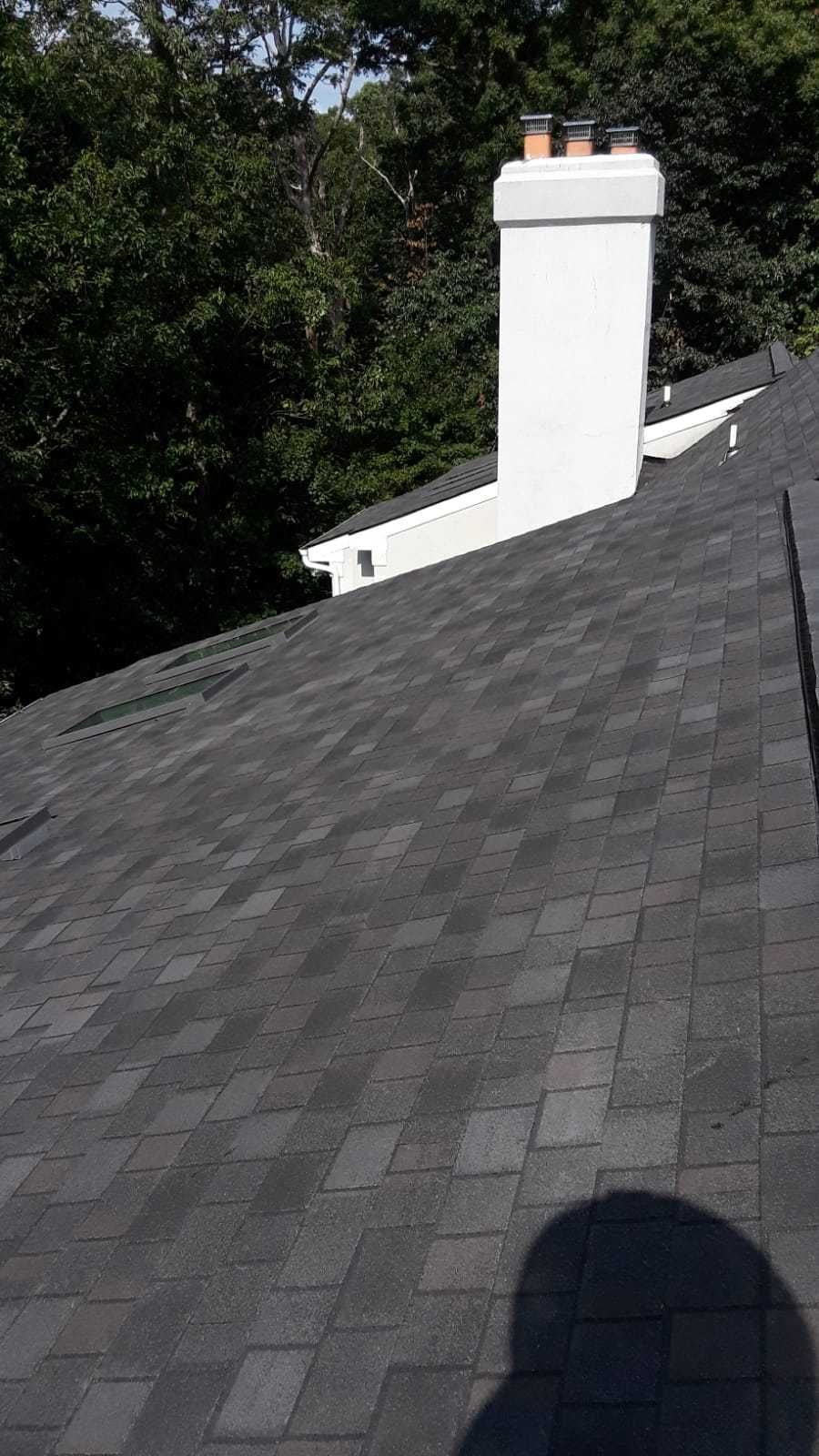 Skylight, Roof, and Gutter Replacement by American Home Contractors