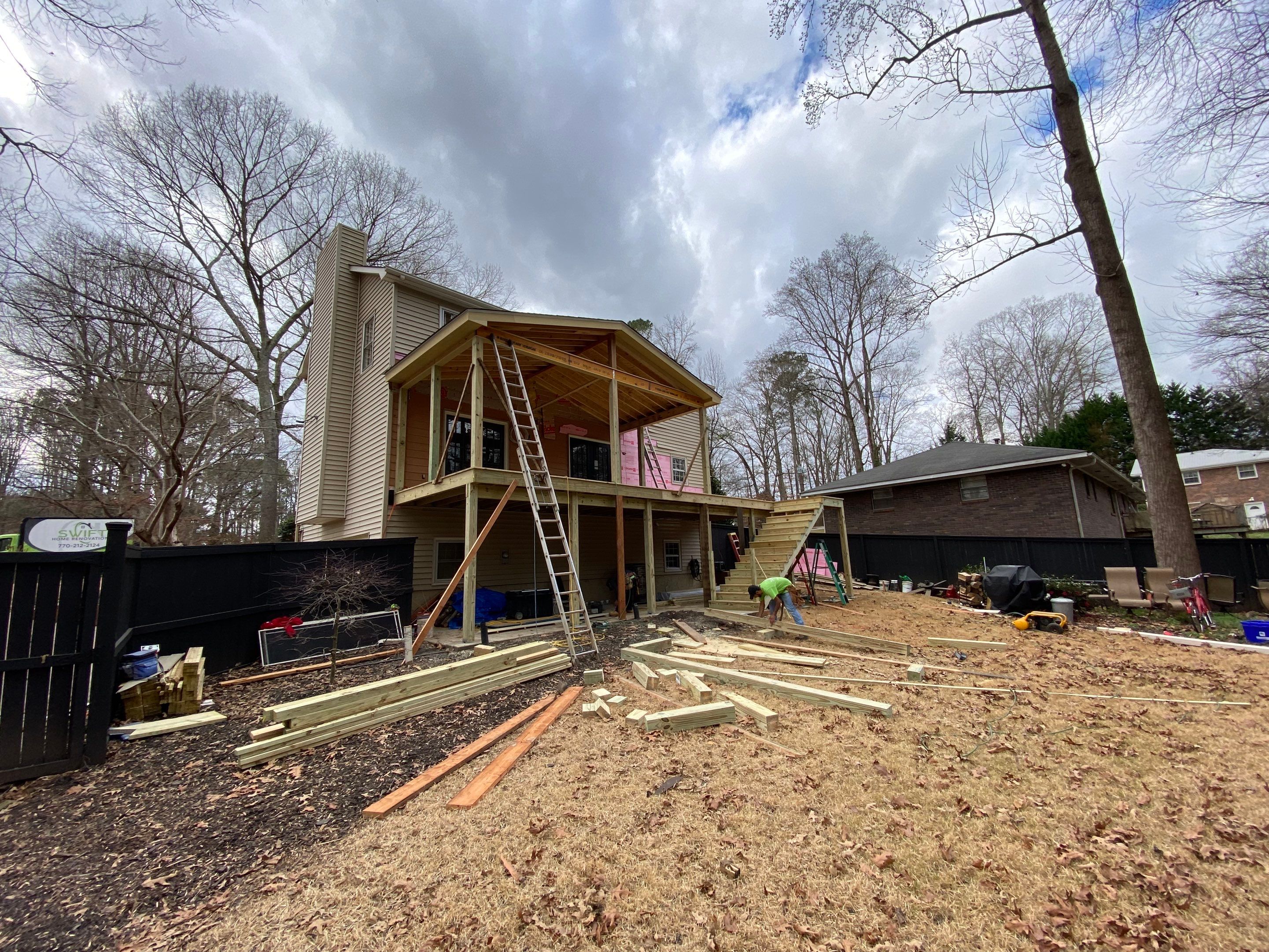 Custom Screened-In Porch and Elevated Deck Construction in Smyrna by Swift Home Renovations