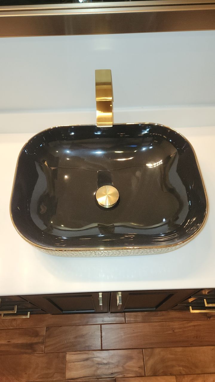 Bookmatched Natural Stone Shower by Legacy Bath and Kitchen 