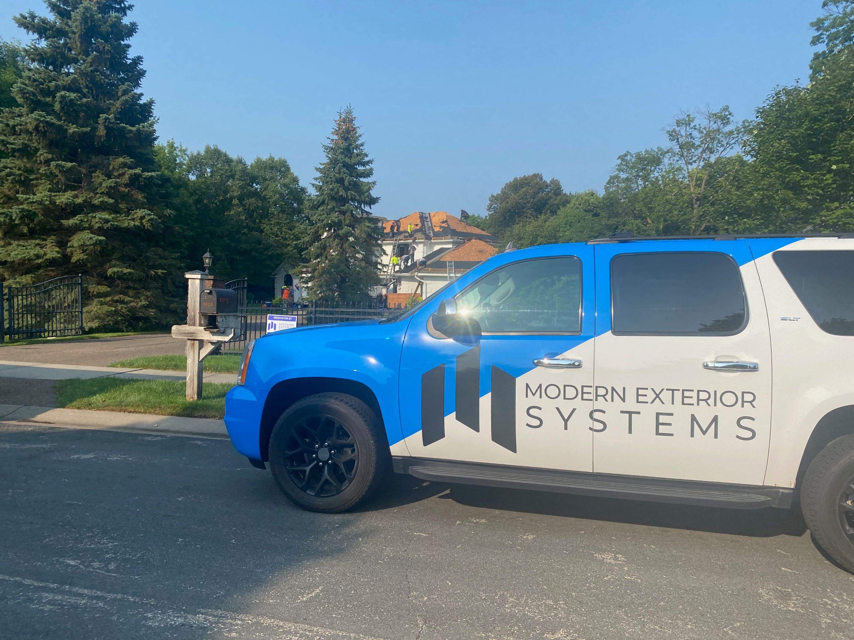 Residential Roofing Installation using Certainteed Landmark Moire Black by MODERN EXTERIOR SYSTEMS
