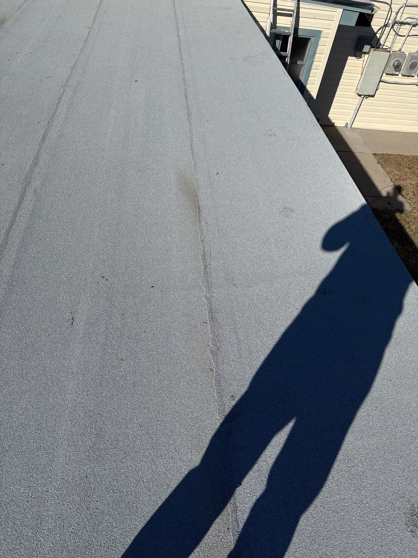 Mustang Island Flat Top by Bayfront Roofing and Construction