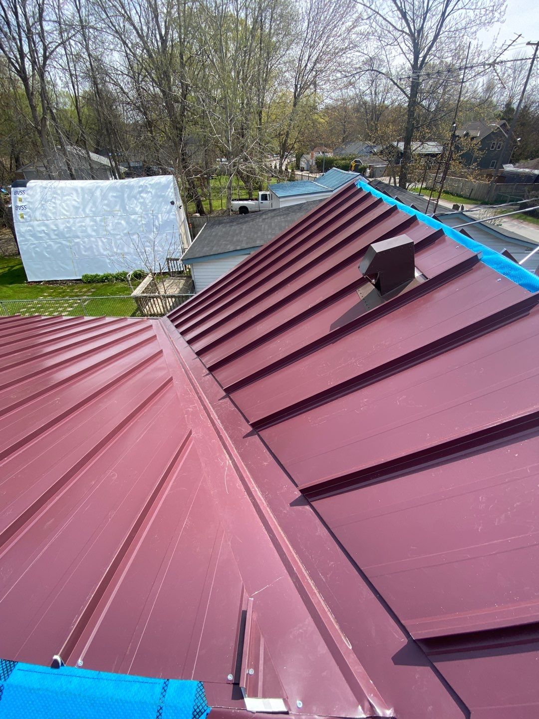 Residential Roofing Installation using 16" Standing Seam Panels by Jay Carter Roofing & Sheet Metal