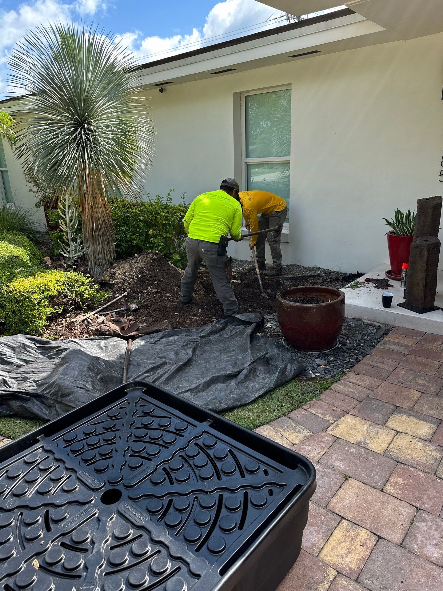 Pinecrest Fountain at Door Entrance by Nature's Dream Landscape and Tree Service