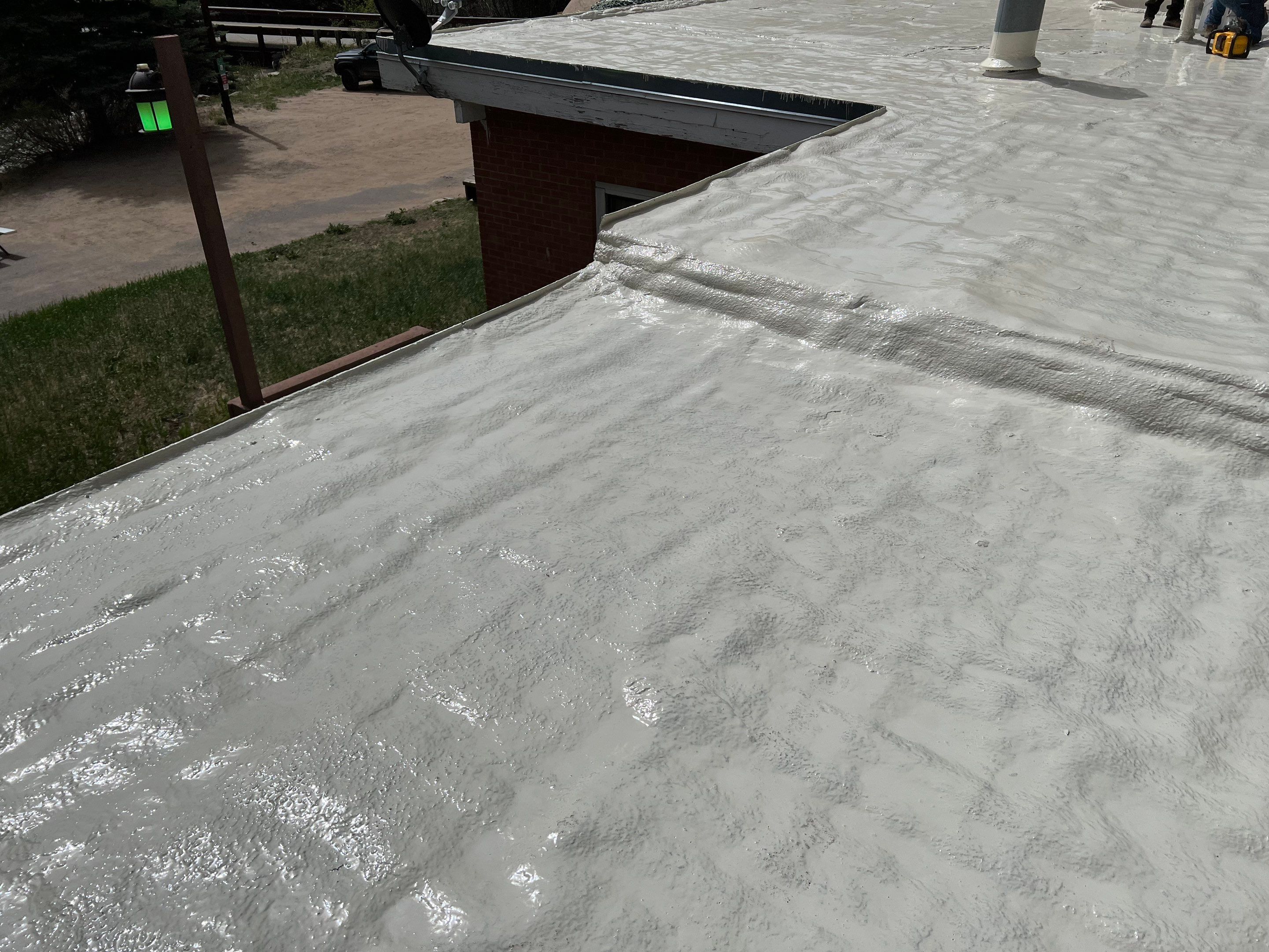 Commercial Roofing Installation using CASTAGRA ECODUR COATING by A to Z Roofing