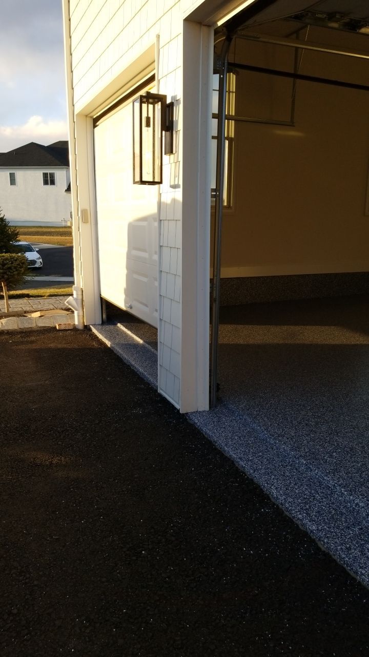 Orbit Penntek Garage Floor by Spectrum Painting, LLC