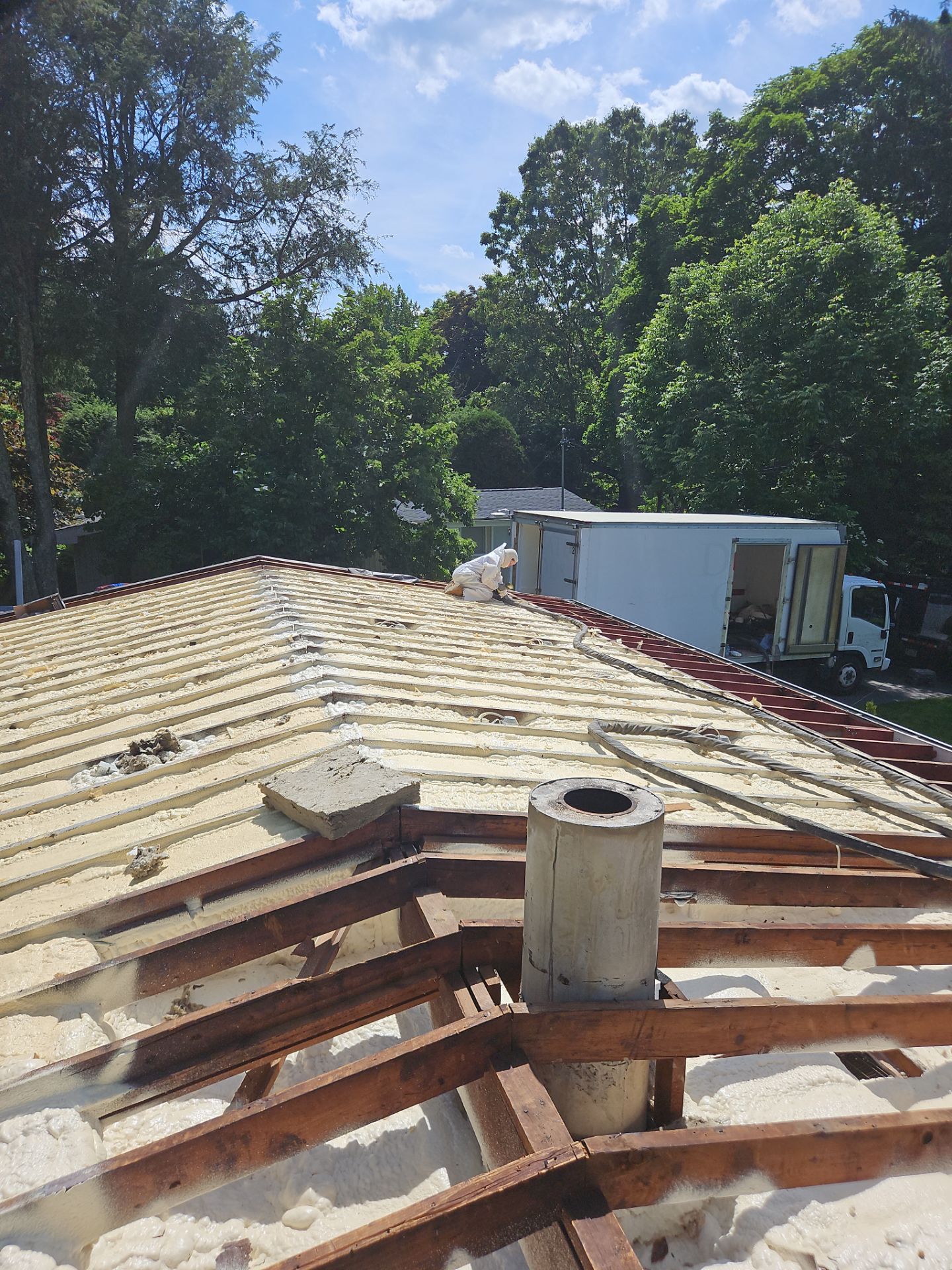 Exterior Installation using Closed Cell Spray Foam by NYS Foam & Energy
