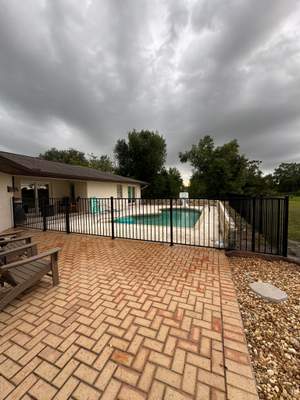 Black Aluminum Pool Safety Fence Installation in Punta Gorda