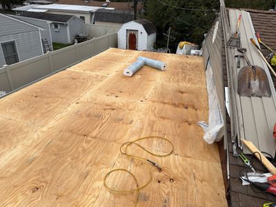 Flat Roof Replacement and Shingle Integration in Levittown