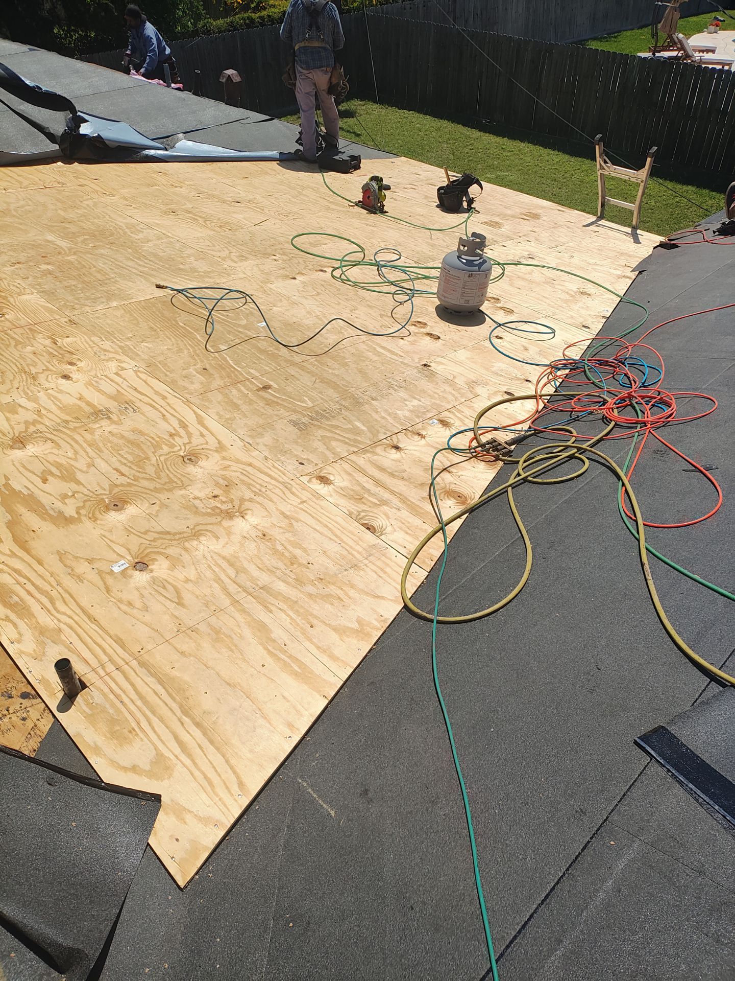 Cover that Patio! by Bayfront Roofing and Construction