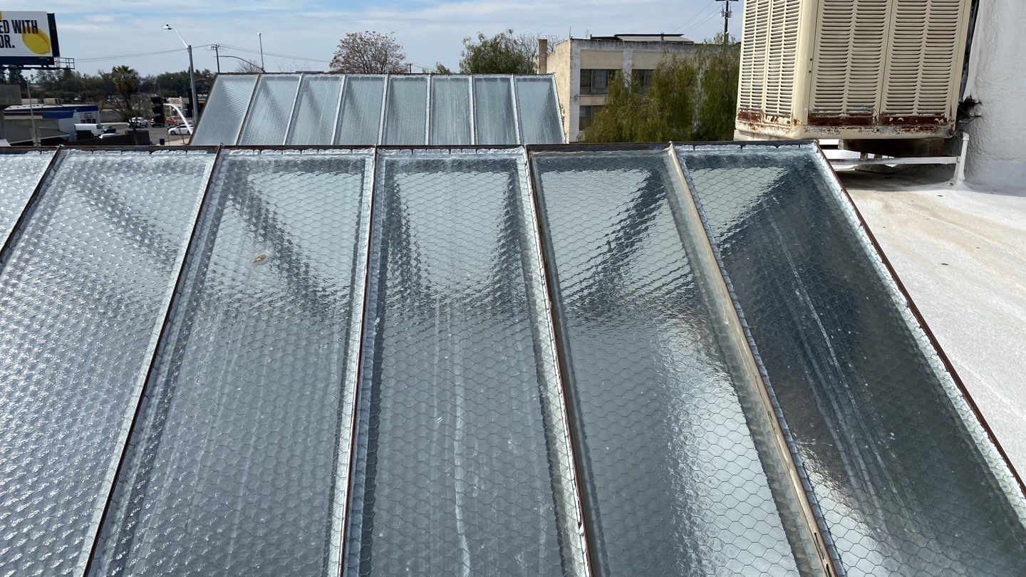 Polyurethane foam roof refurbish and recoating by Straight Edge Roofing Inc