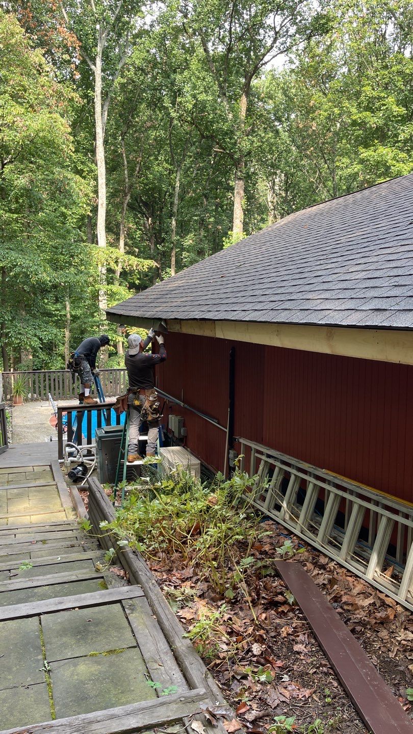 Deckhouse Roof Replacement by American Home Contractors