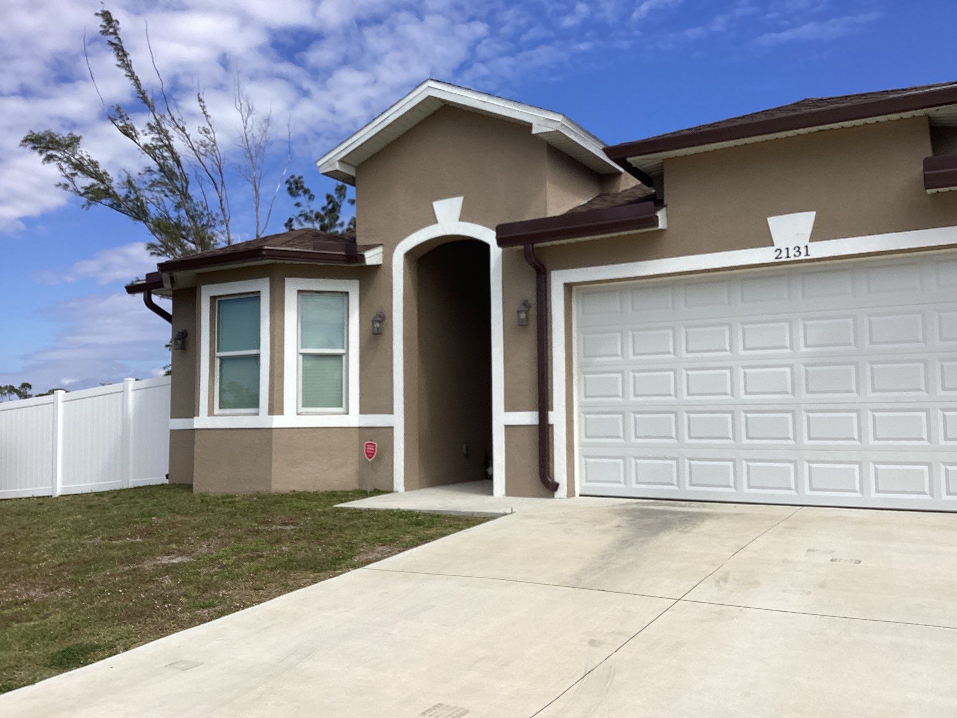 Royal Brown Seamless Gutters in Cape Coral FL by Gutter Professors
