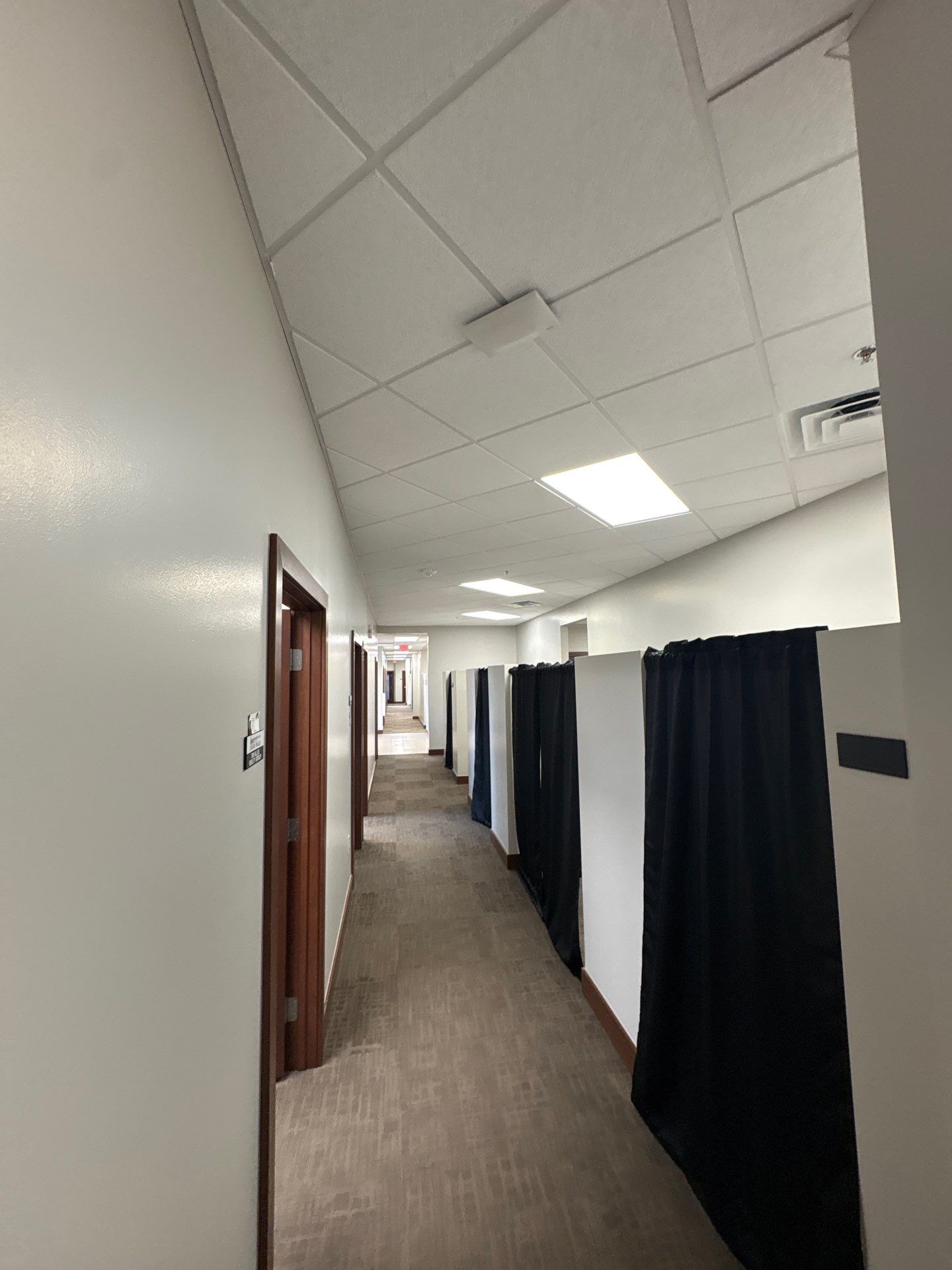 Commercial Office Interior Remodel and Modern Suite Refresh in Sioux Falls by Select Painting, Coatings & Garage Cabinets
