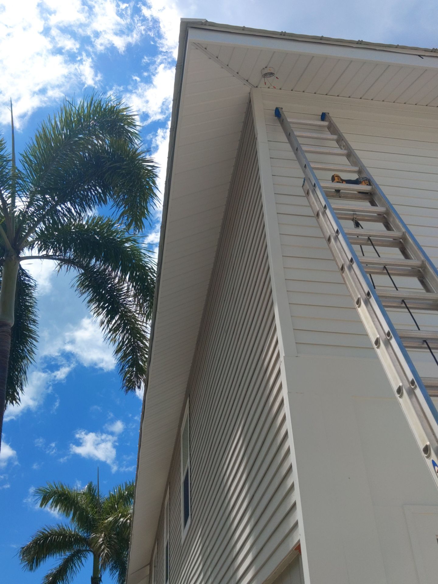 Complete Gutter System with Downspouts & Guards in Fort Myers Beach FL by Gutter Professors