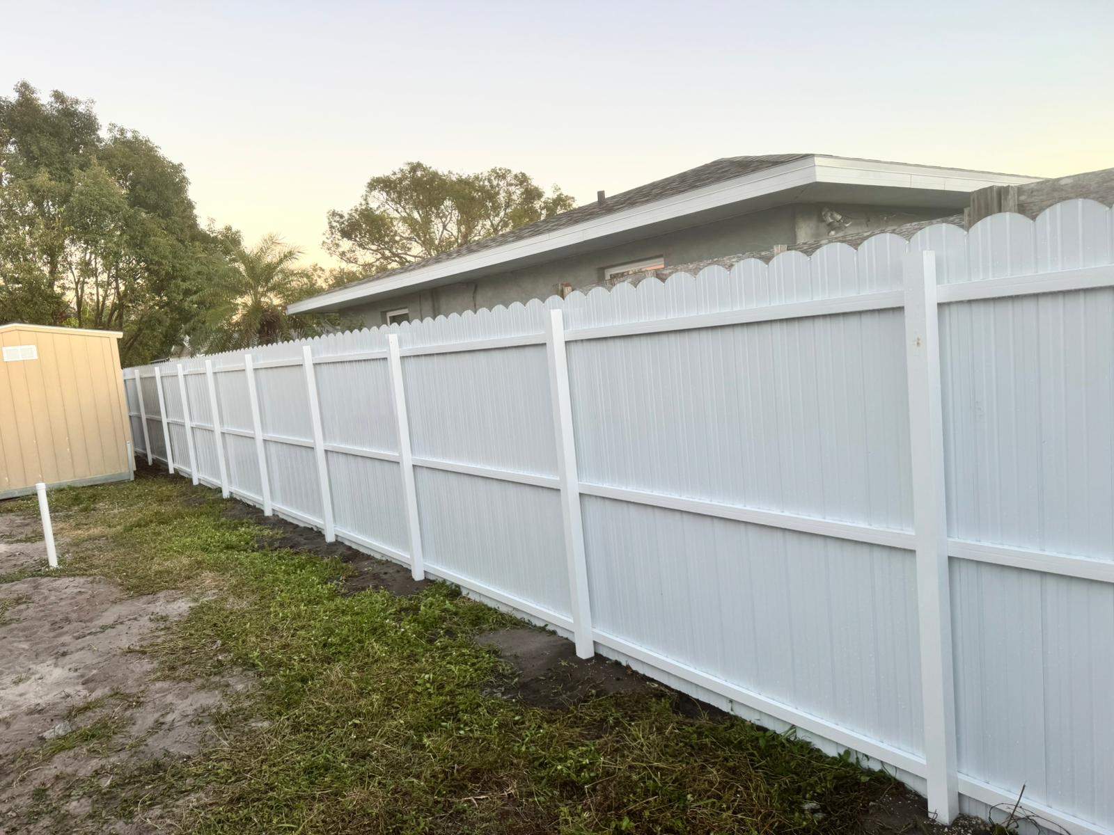 White Vinyl Privacy Fence Installation in Bradenton, Florida by True Fence LLC