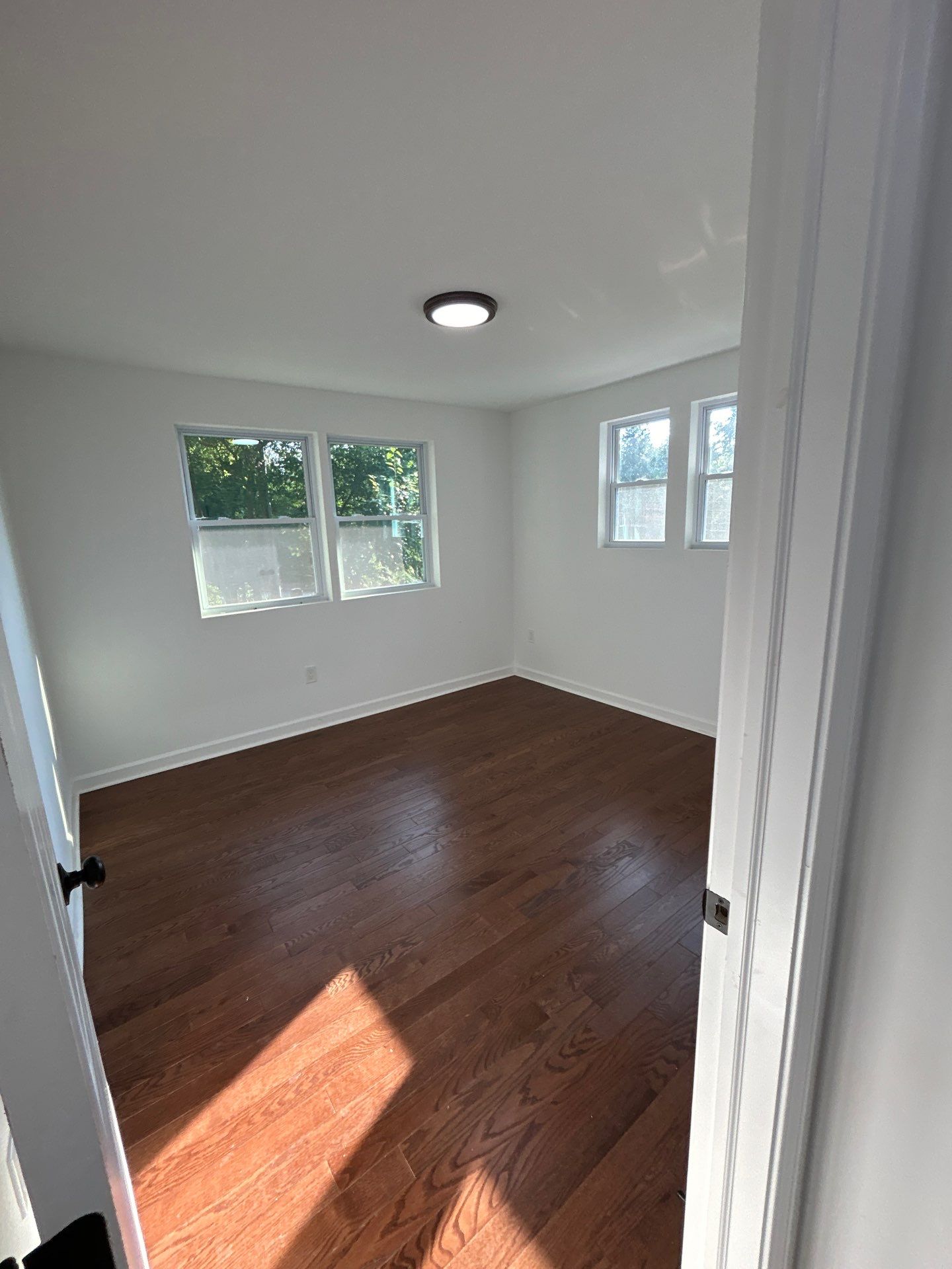 Replaced LVP with timeless solid oak by Footprints Floors of East Atlanta