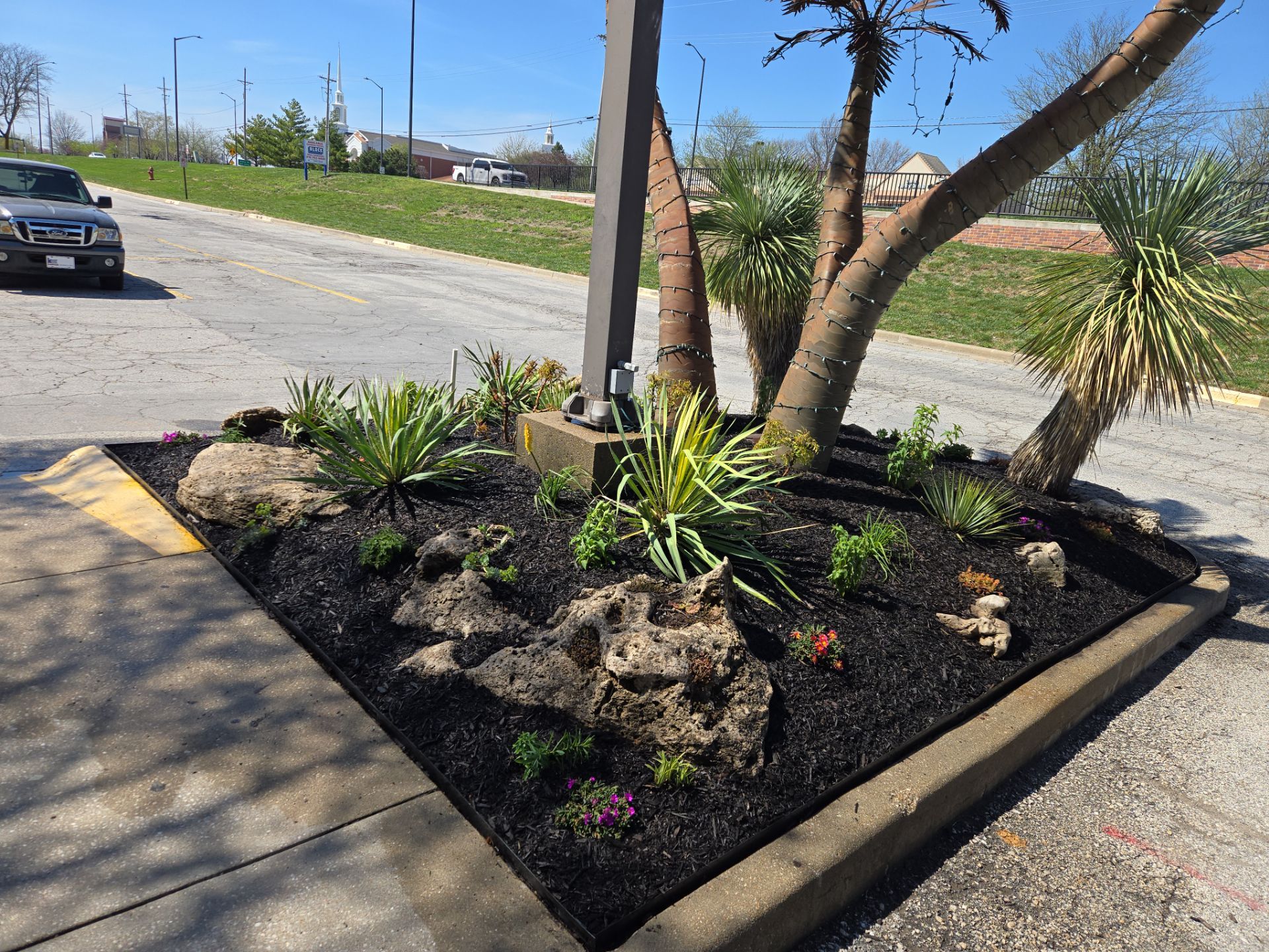 Restuarant Landscape Installation and Parking Lot Islands in Lenexa by LAND ESCAPES LLC
