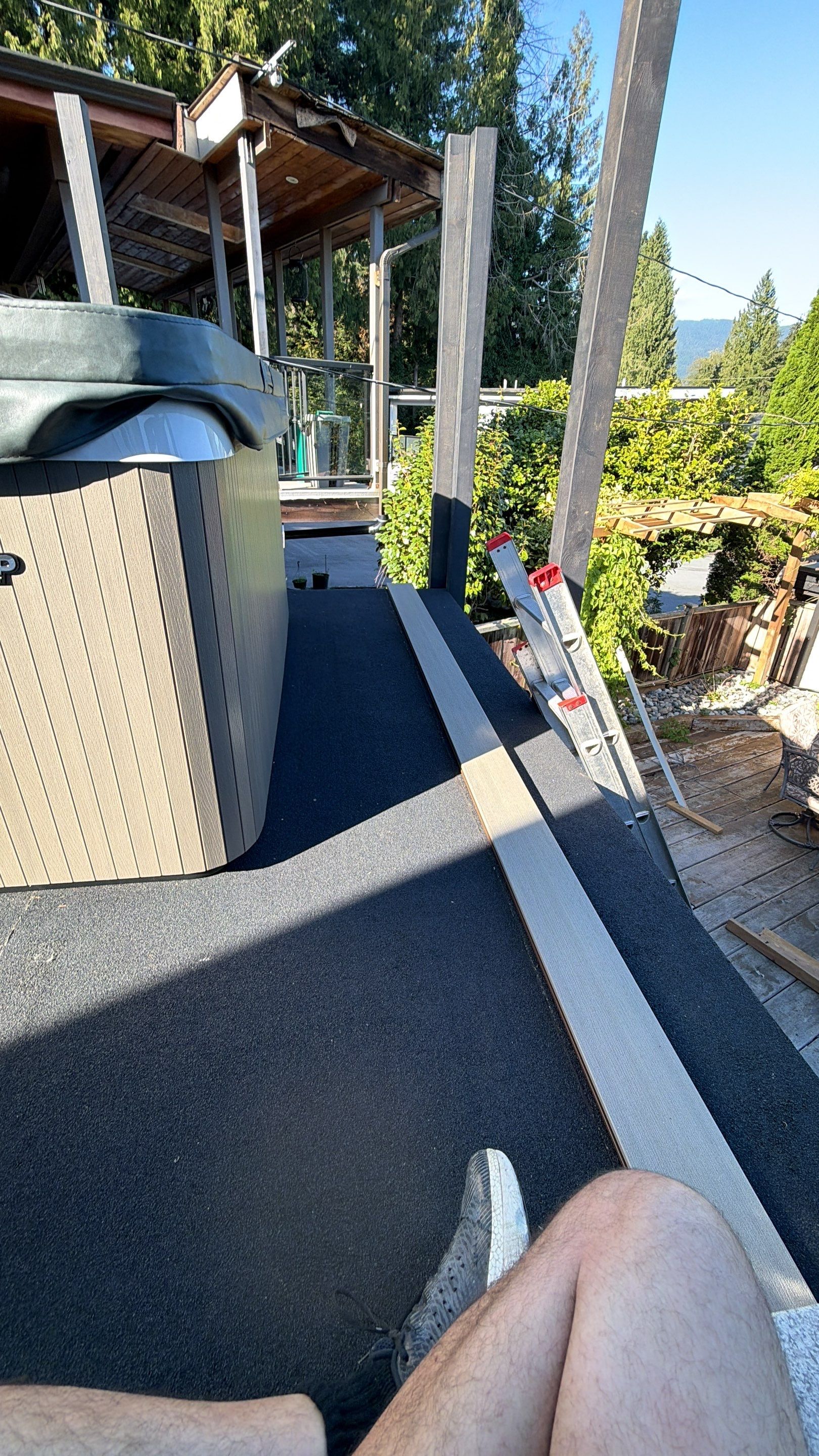 New Composite Deck with glass railing in North Vancouver by YVR Construction Group