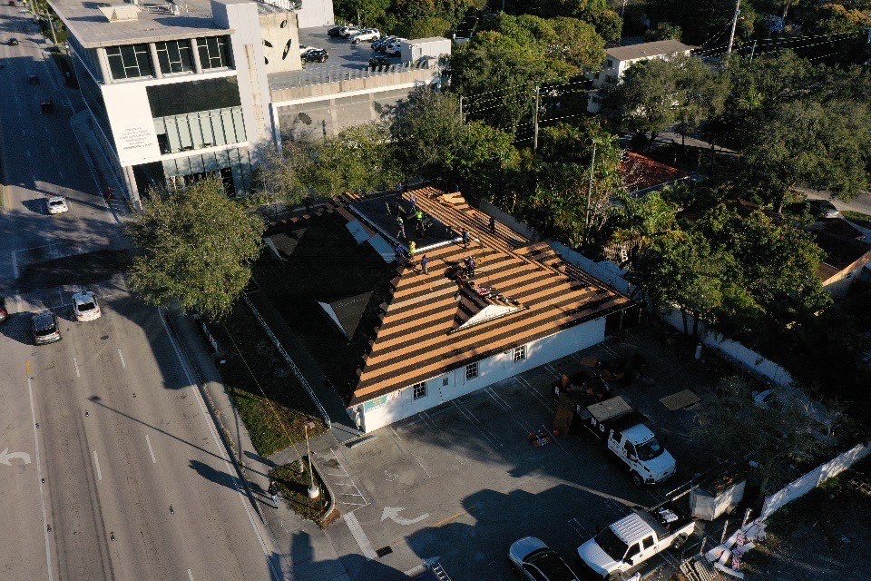 COMMERCIAL REROOF 24 GUAGE MEDIUM BRONZE 1-1/2" MECHANICAL SEAM "ZEBRA METHOD" by Earl W. Johnston Roofing 