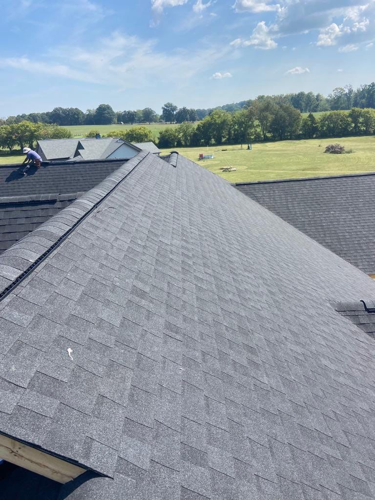 Residential Roofing Installation using Tamko Heritage AR with Standing Seam Metal Porch by Undersun Roofing 