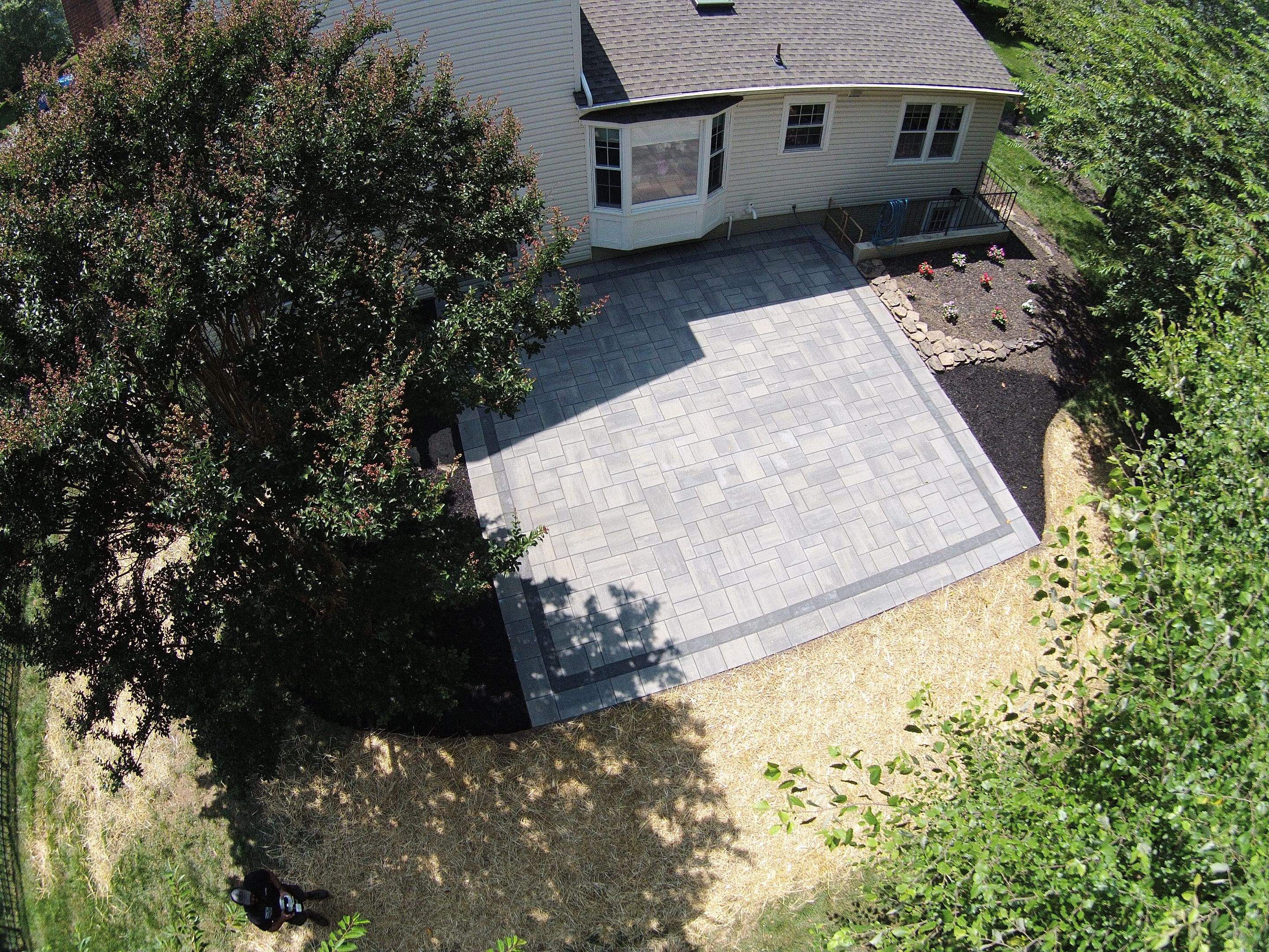 Backyard Transformation using Techo-Bloc Pavers by The Smet Companies, LLC