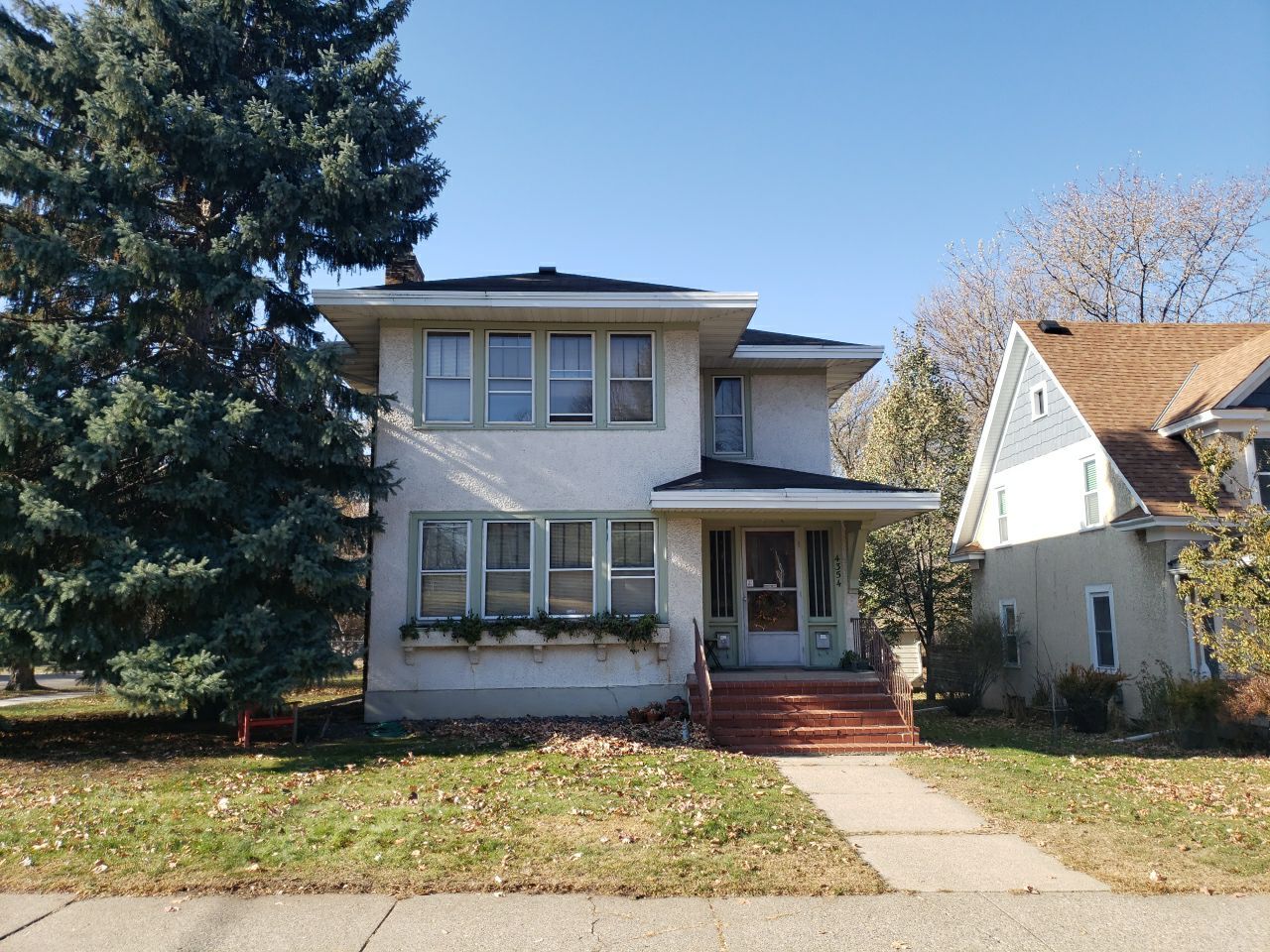 Minneapolis, MN – Roof and In-Roof Gutter System Replacement by First Impressions Exteriors
