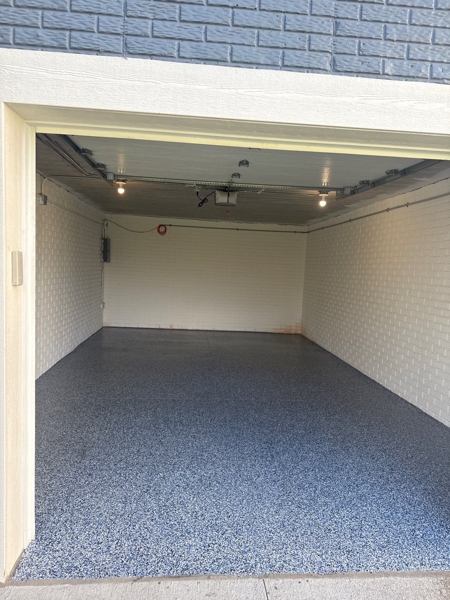 Grimes Garage Floor Coating by Revival Concrete Coatings