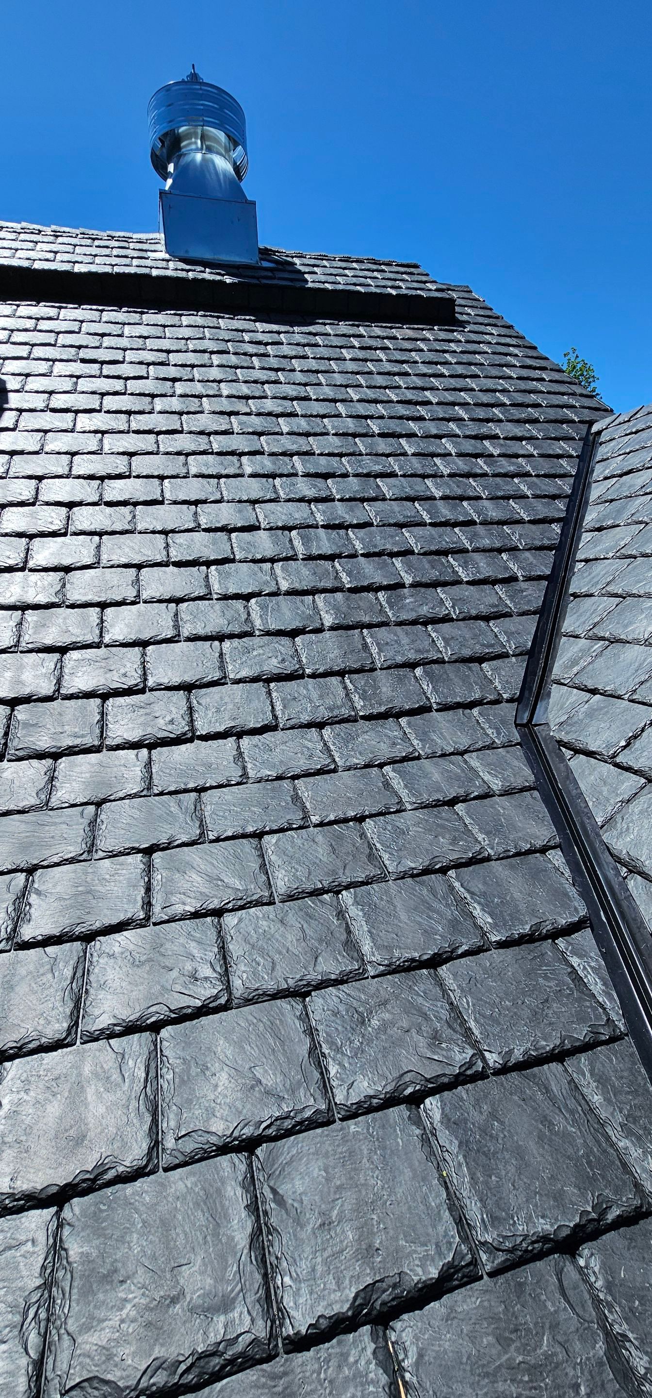 Residential Roofing Installation using Brava Synthetic Slate in Bozeman, MT by swagg construction