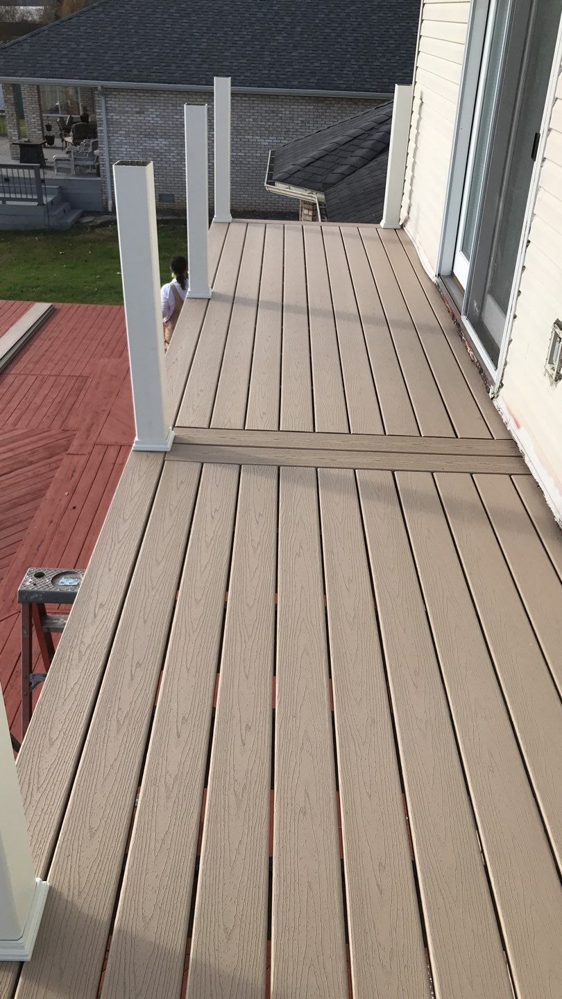Deck Refurbush and Door Replacement using Trex Decking and Railing.  Polaris Patio Doors by Secure Construction Company Inc