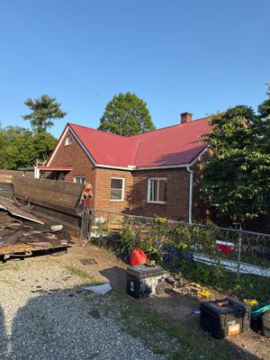 Residential Roofing Installation using Metal
