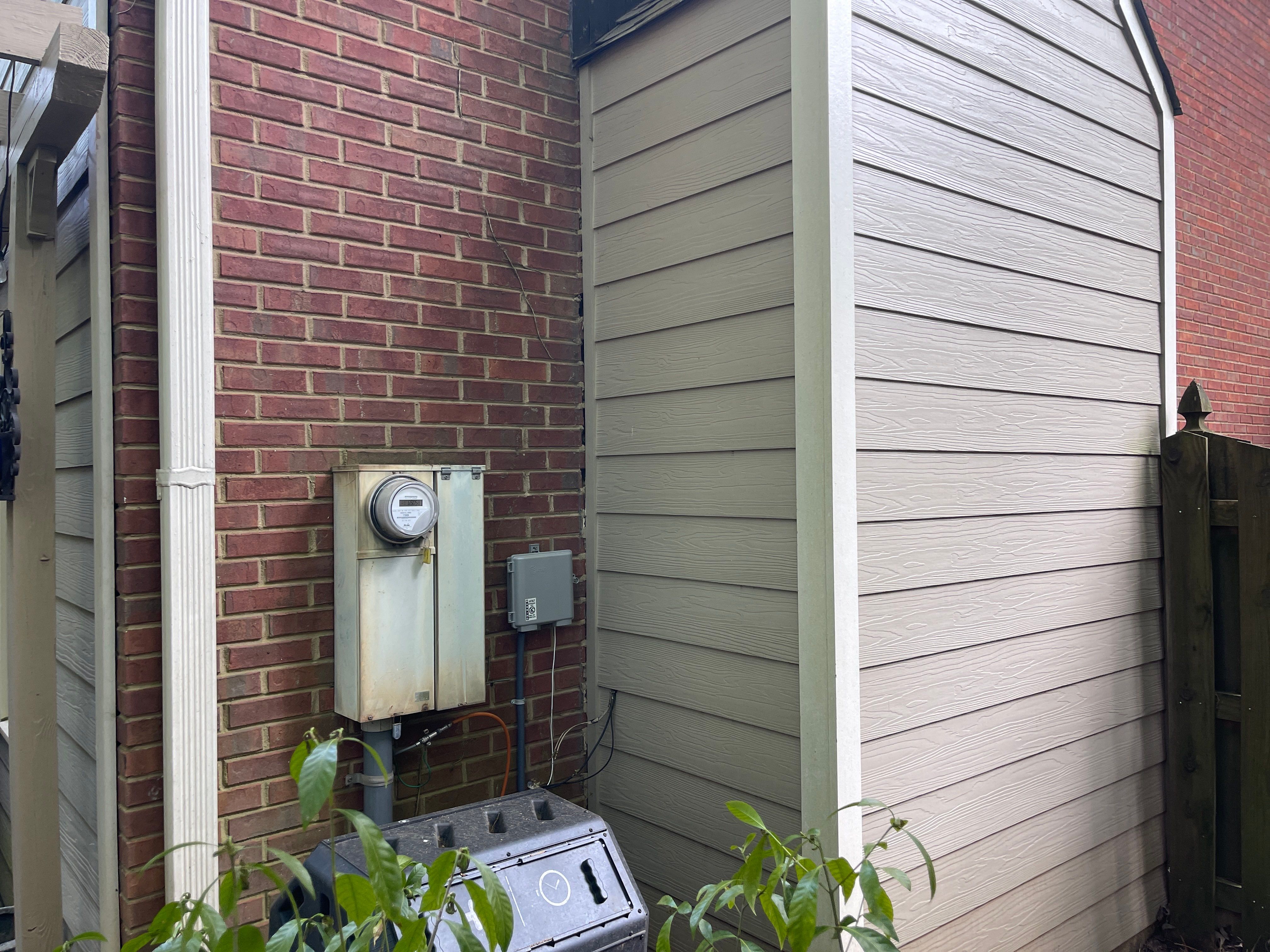 Marietta, GA Rotten Wood Replacement, Chimney Corner Board Installation, Gutter Replacement, and Exterior Painting by Nelson Exteriors