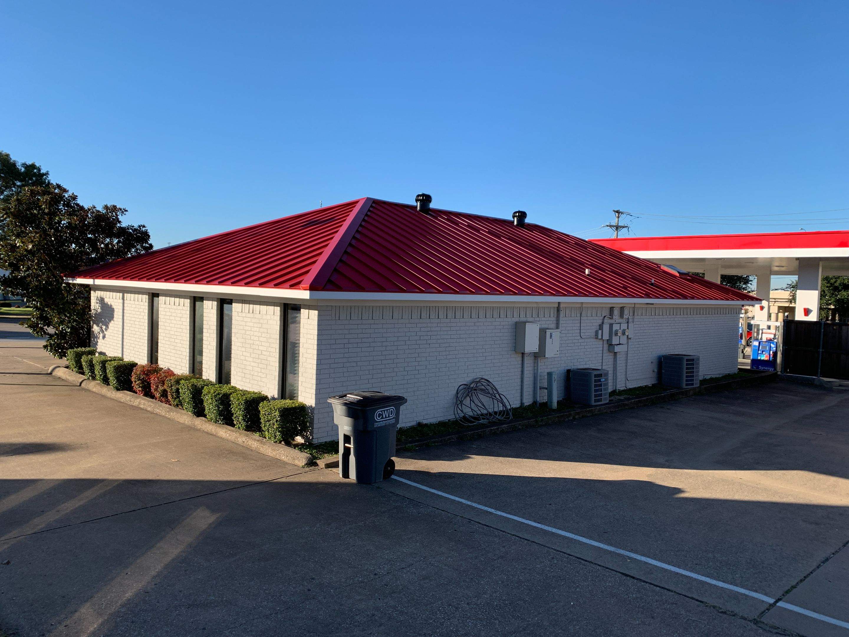 Commercial metal roof by Springtree Restoration 