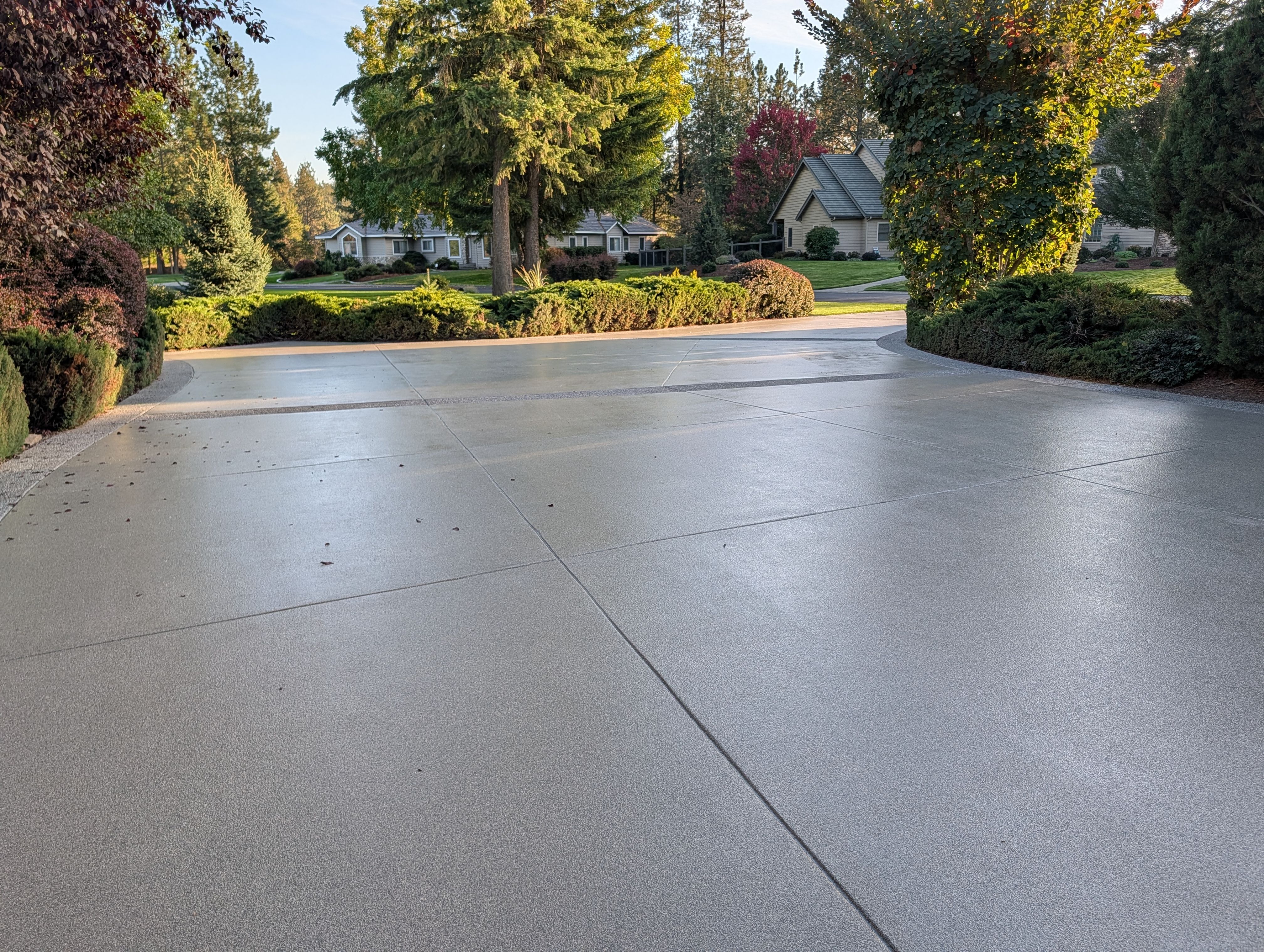 Driveway using Penntek Evolution System and Trail Mix 1/8" Chip by Croc Coatings, LLC