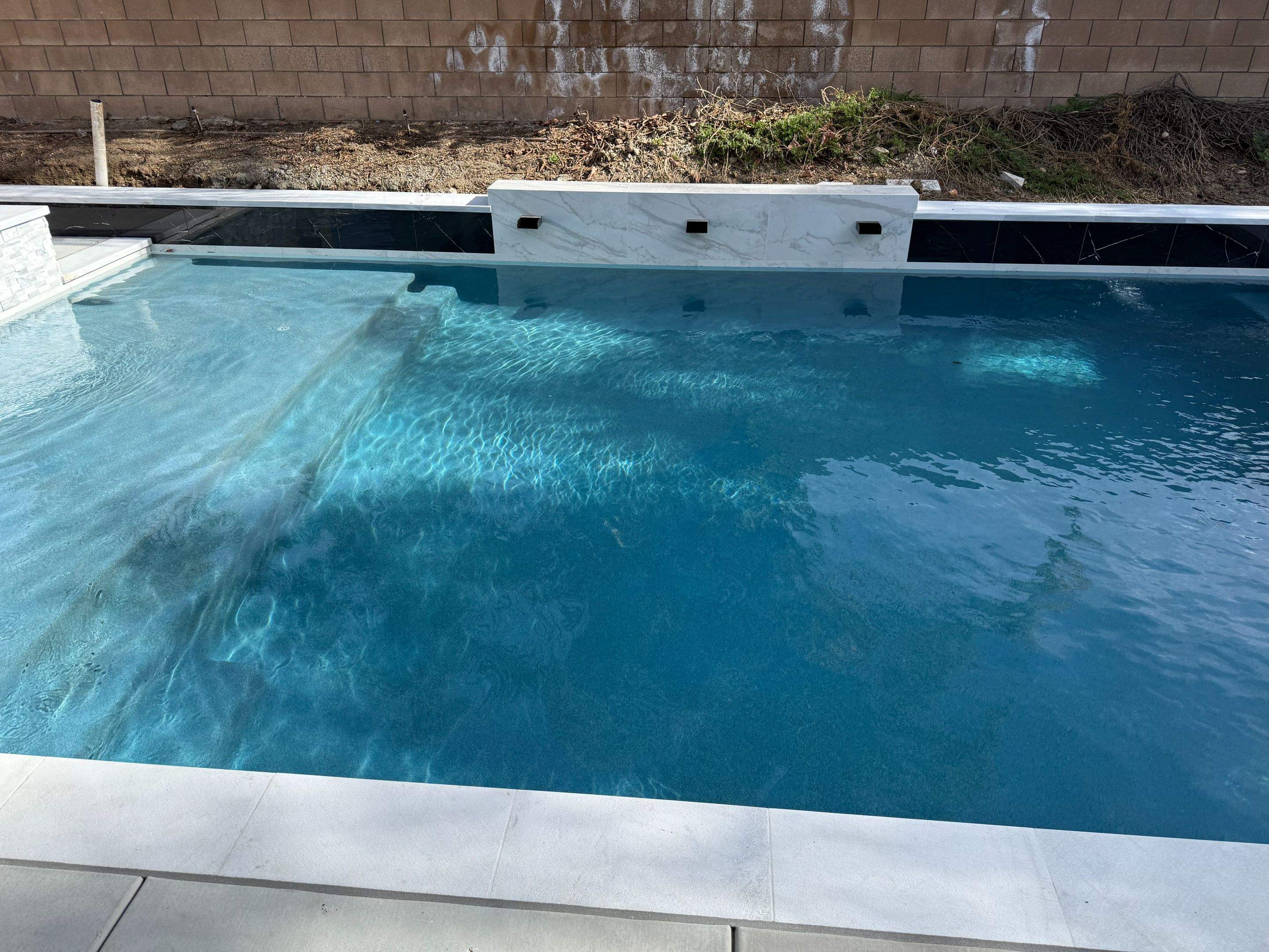 Pool and spa by Premier Pools and Spas Temecula
