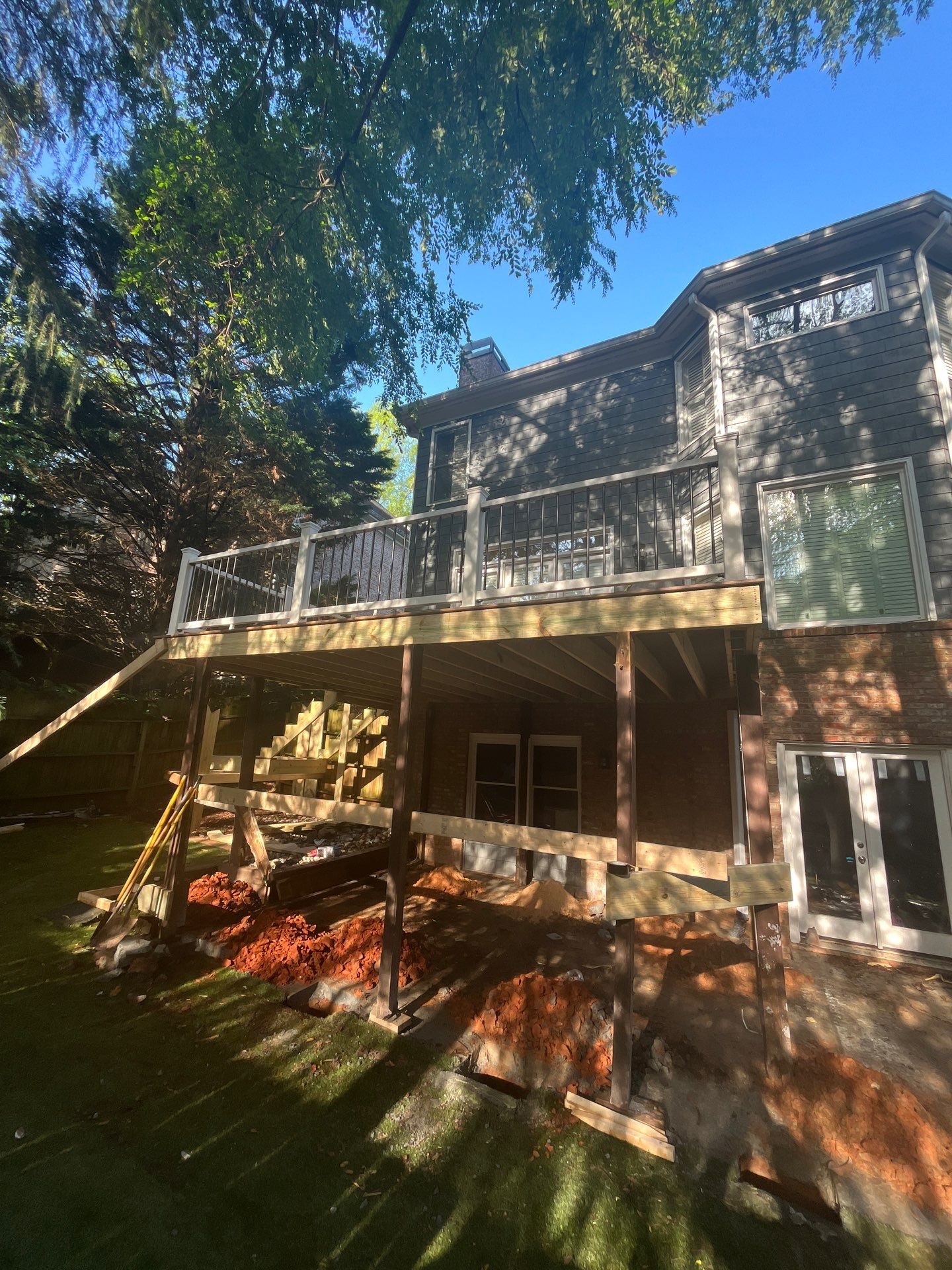 Trex New Deck Build with Screened in Under Deck by Nelson Exteriors 