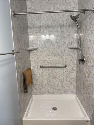 Jacuzzi Walk-In Shower Conversion Featuring Marble Acrylic Walls in Gaylord