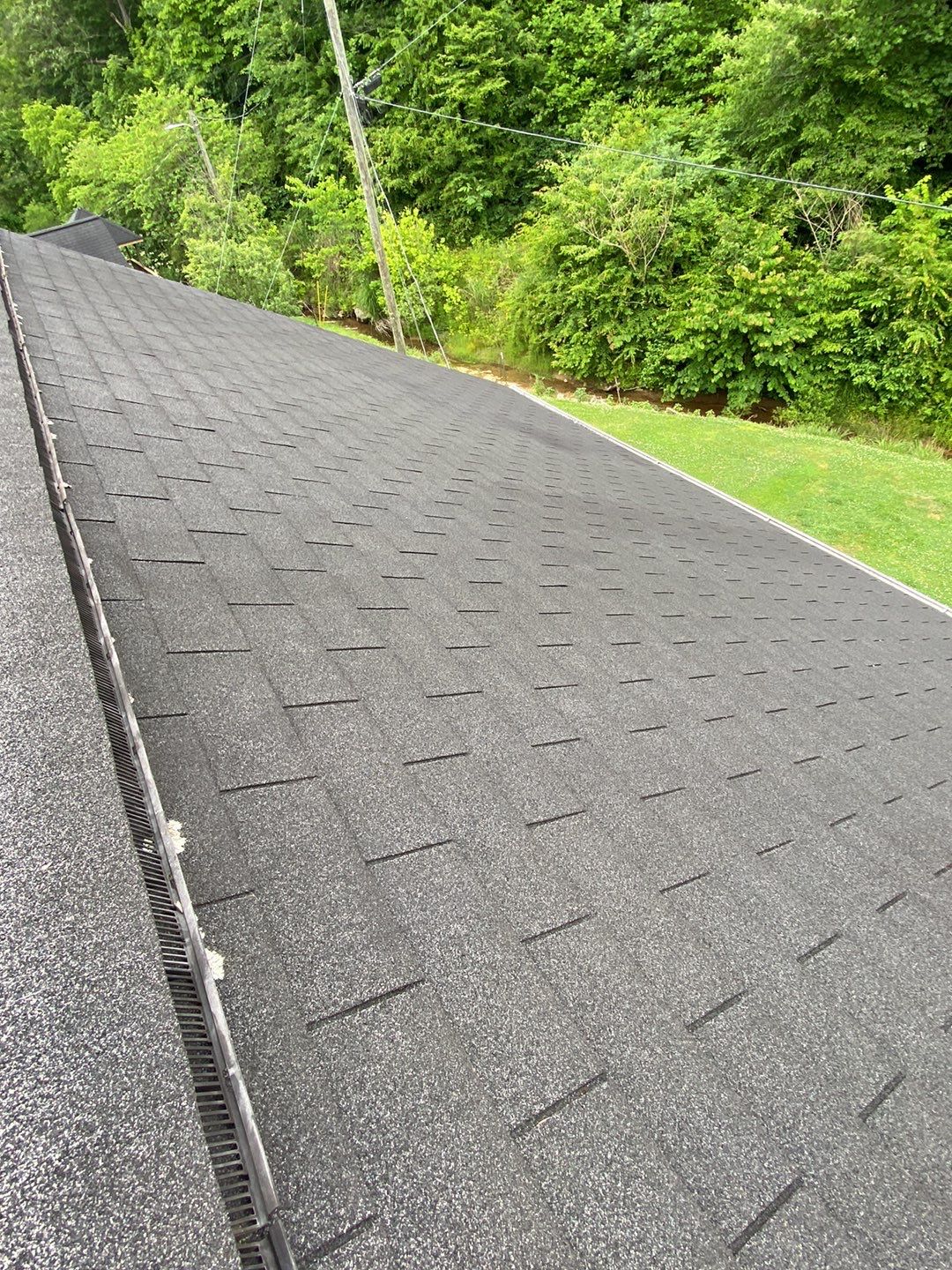 Residential Roofing Installation using Performance Shingles by Mr. Roofer