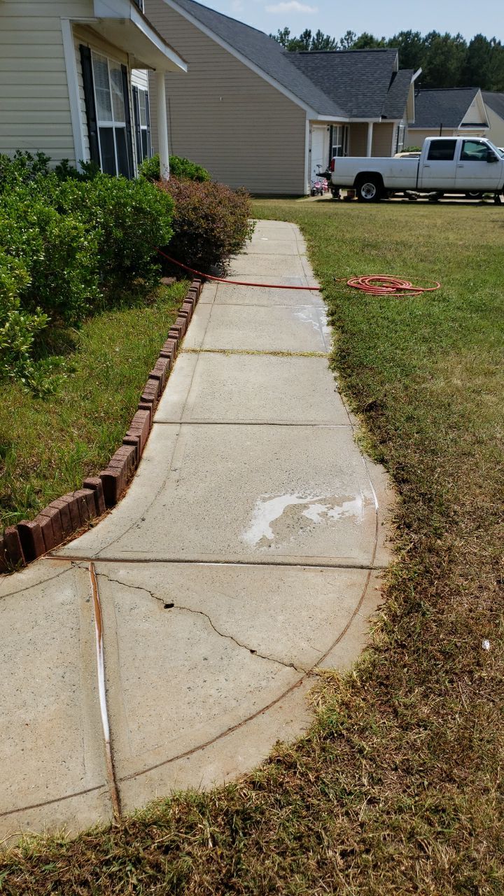 House Wash using cleaner by Power Wash Masters LLC