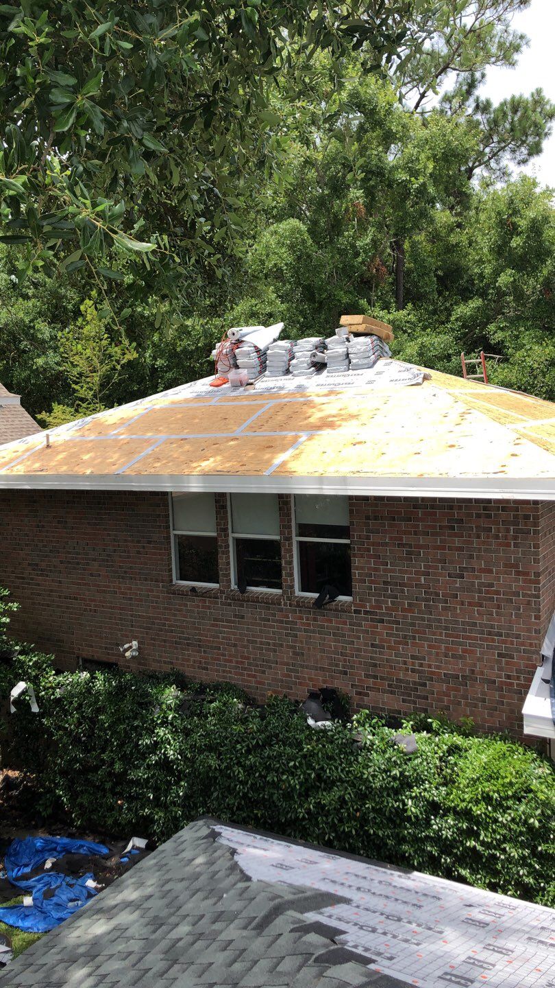 Residential Roofing Installation using Roof Replacement by American Roofing & Construction LLC