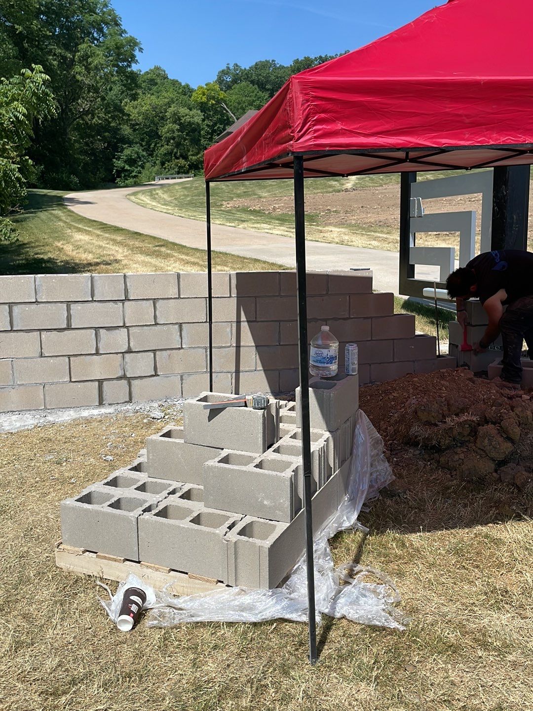 Fence / Retaining Wall using Block then parge by ACE Waterproofing & Basement Solutions
