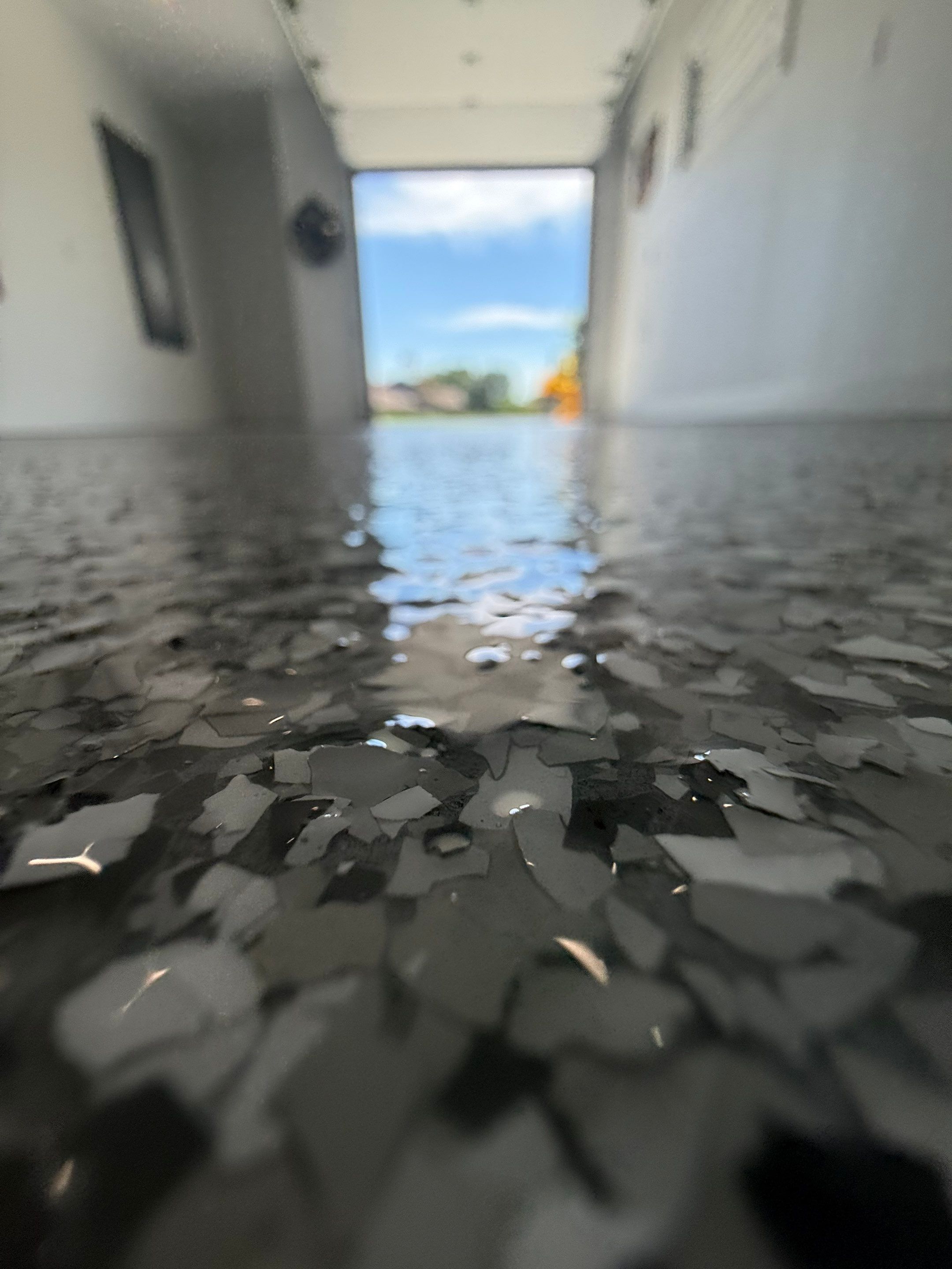 Gravel Flake Garage Floor Coating in Yankton by Select Painting, Coatings & Garage Cabinets