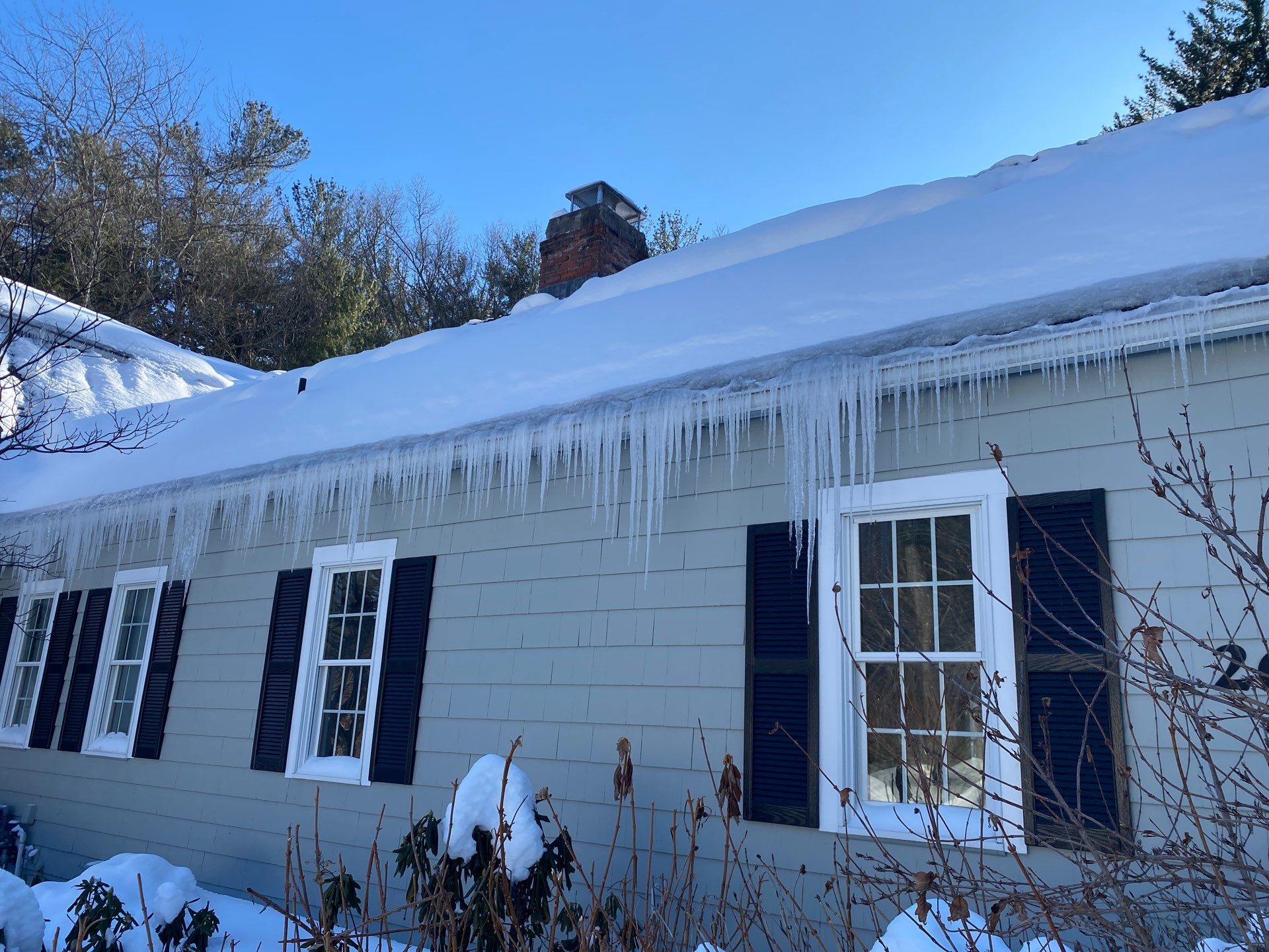 Snow removal by Mighty Dog Roofing of Greater Middlesex County