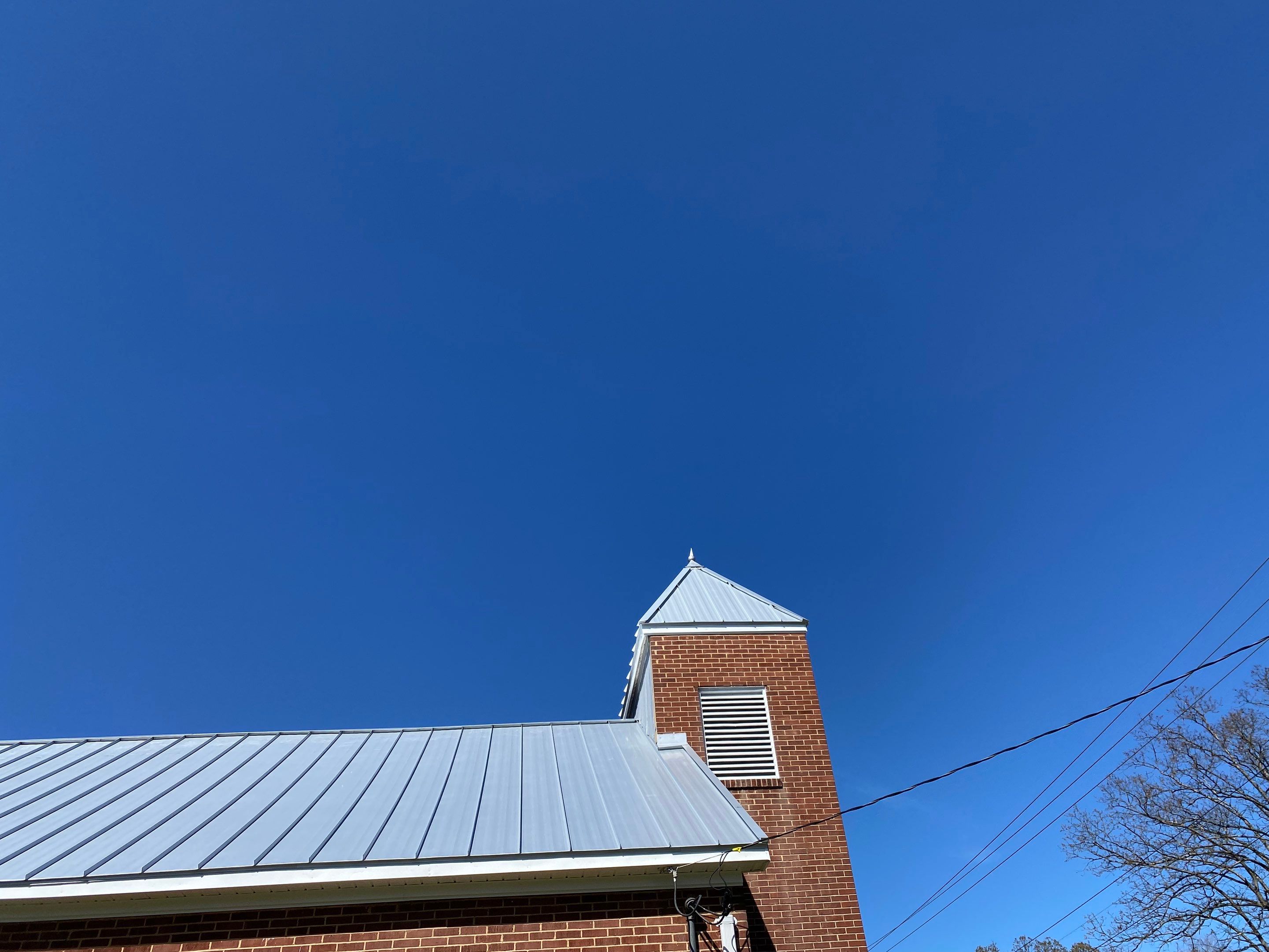 Primitive Baptist Church using Standing Seam Metal by Just In Time Roofing and Restoration