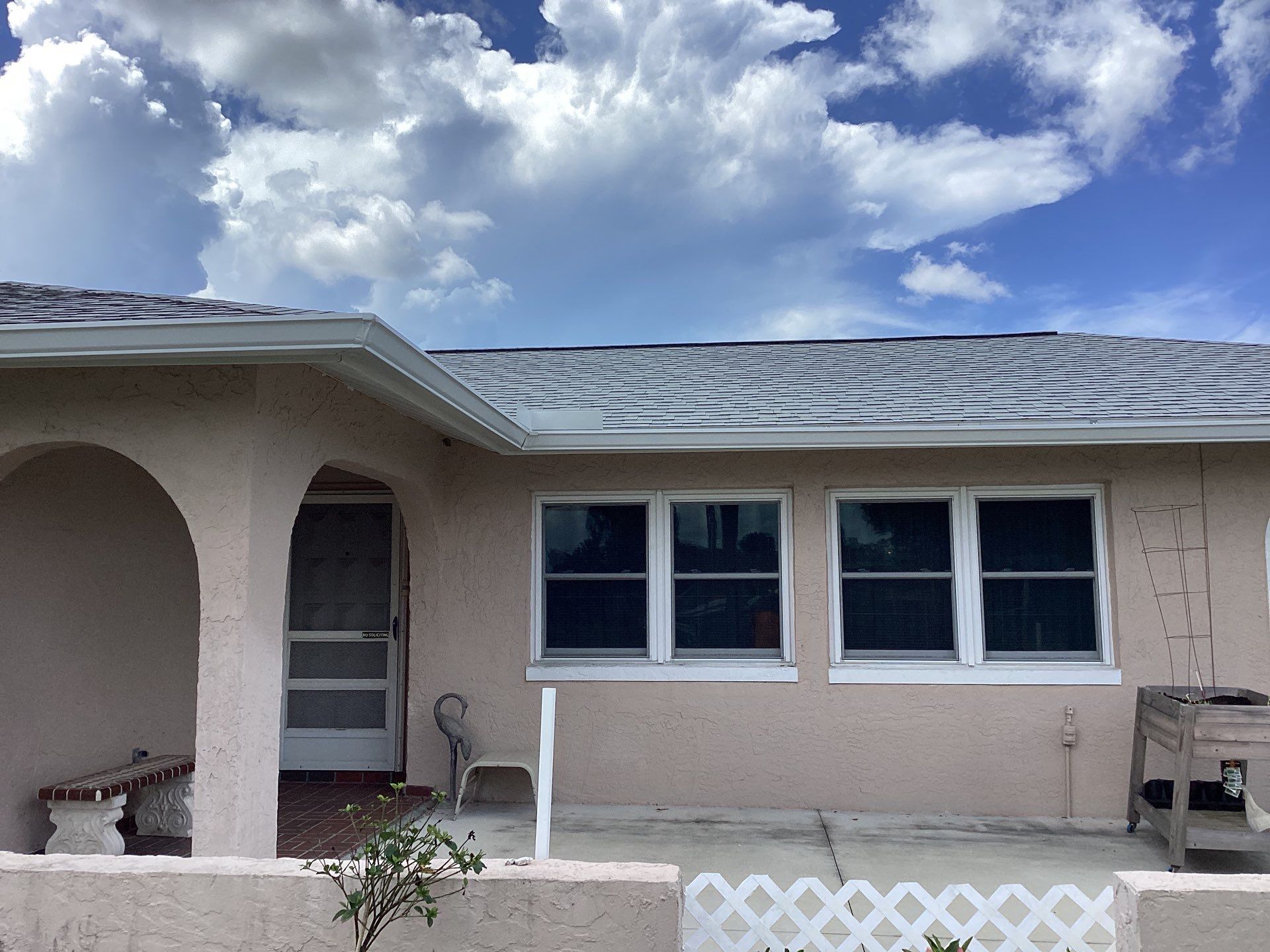 White Seamless Gutters and Splash Guards in Fort Myers FL by Gutter Professor by Gutter Professors