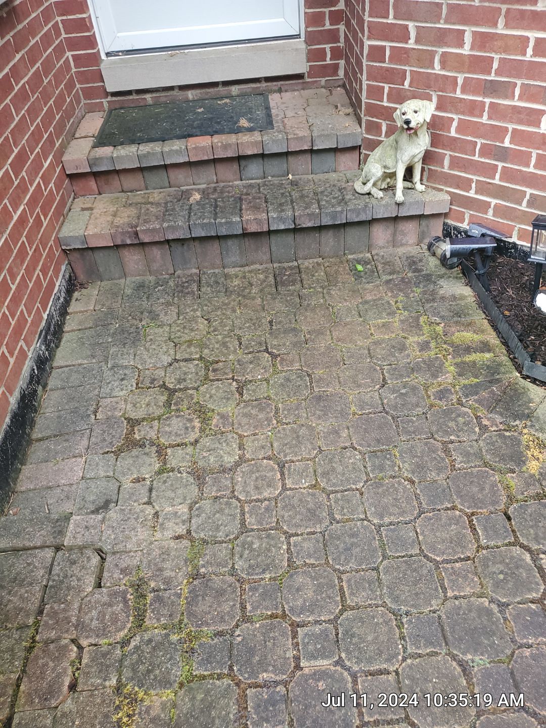 Brick paver repair, clean and seal by Northern Power Washing LLC.